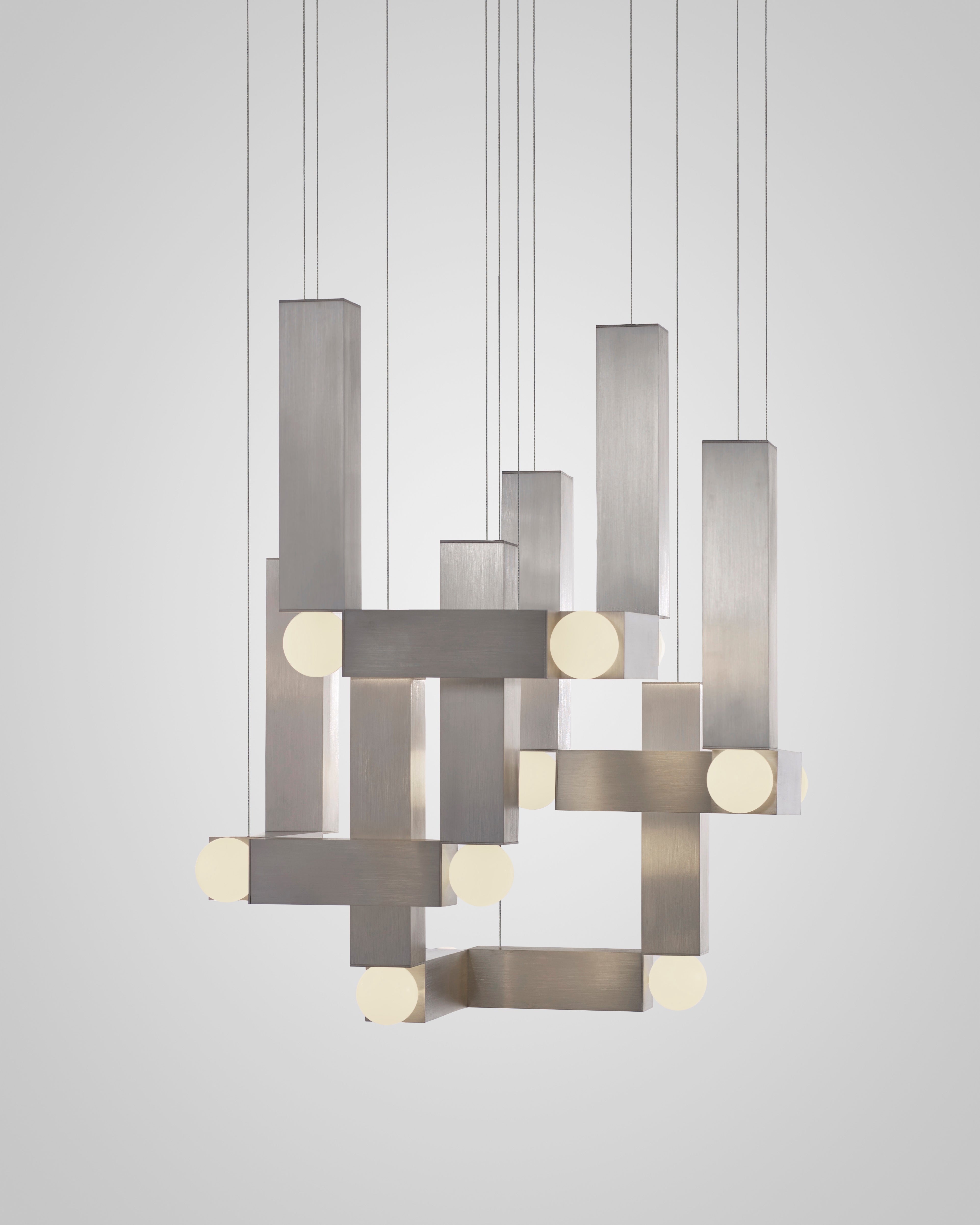 VESPER QUATTRO pendant lamp with an opal shade and silver finish.
