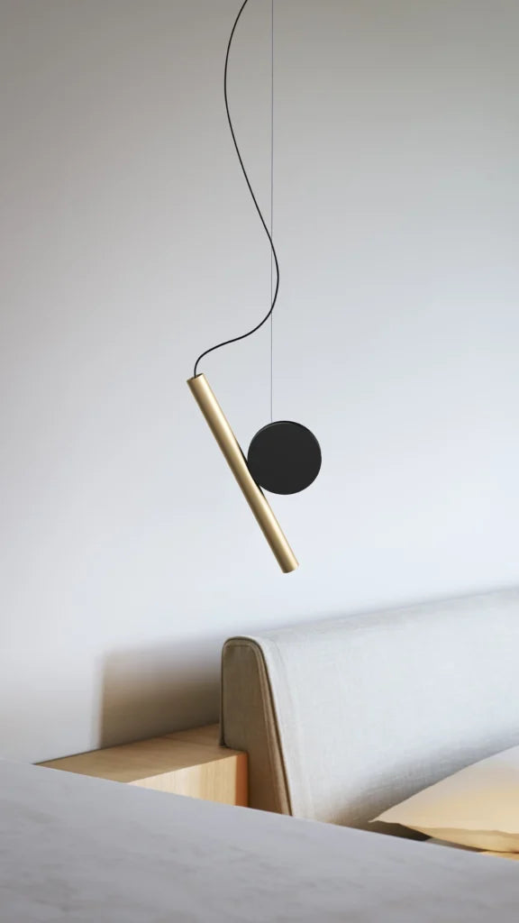 Hanging lamp is brass with black