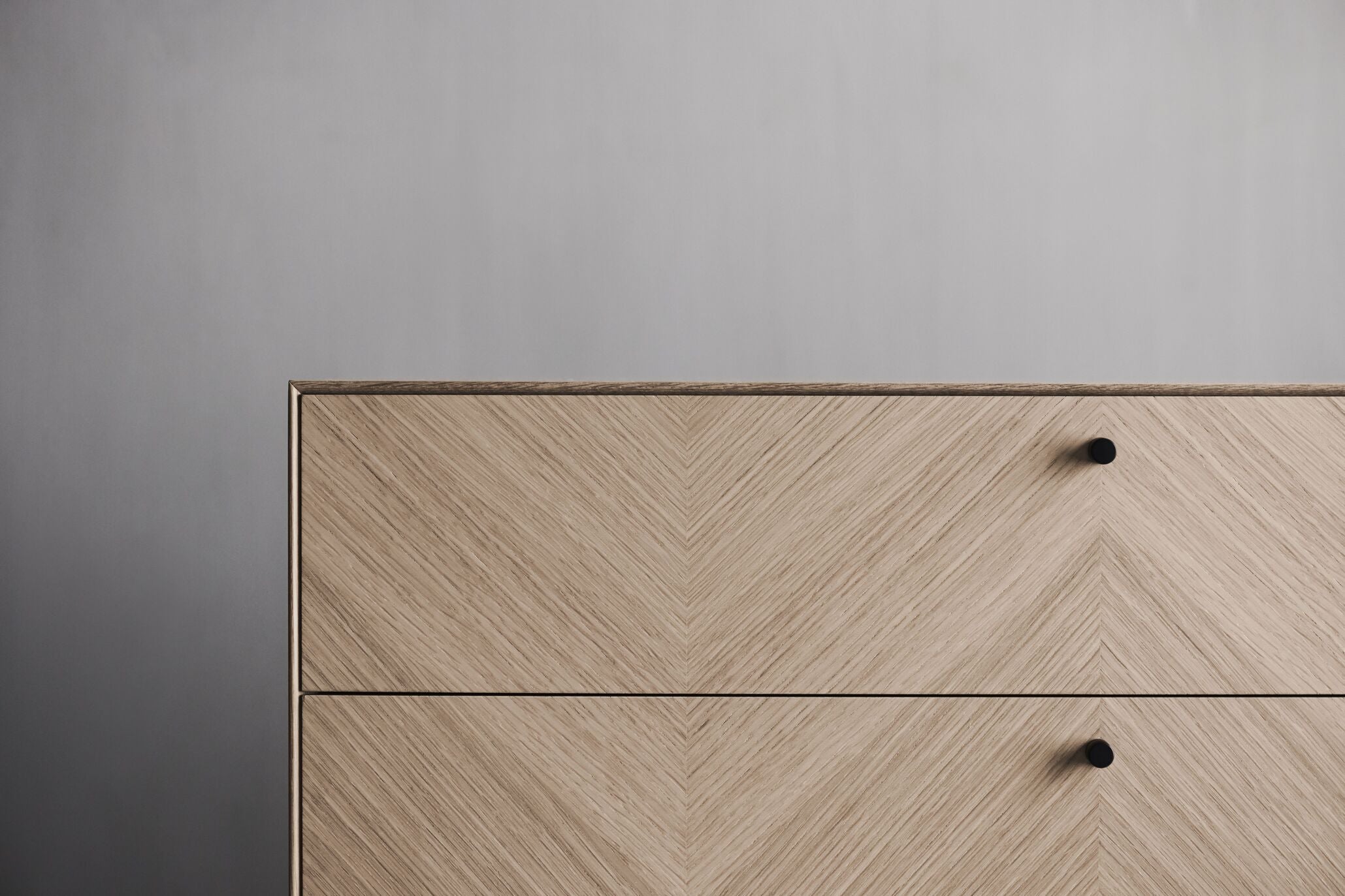 Luxe chest of drawers bleached oak wood with a gray base