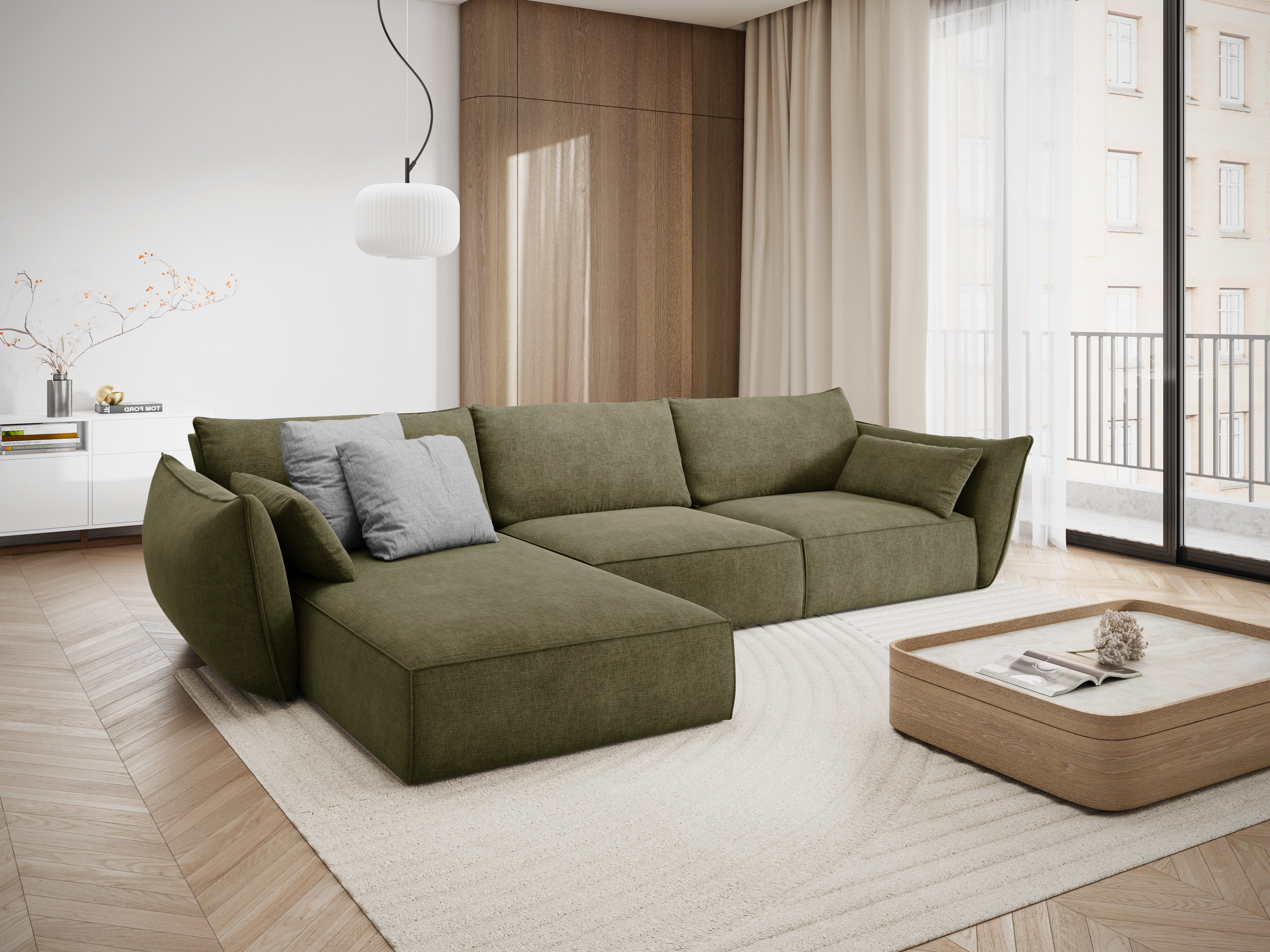 A corner in the SZENIL Fabric left-hand 4-person Vanda Green