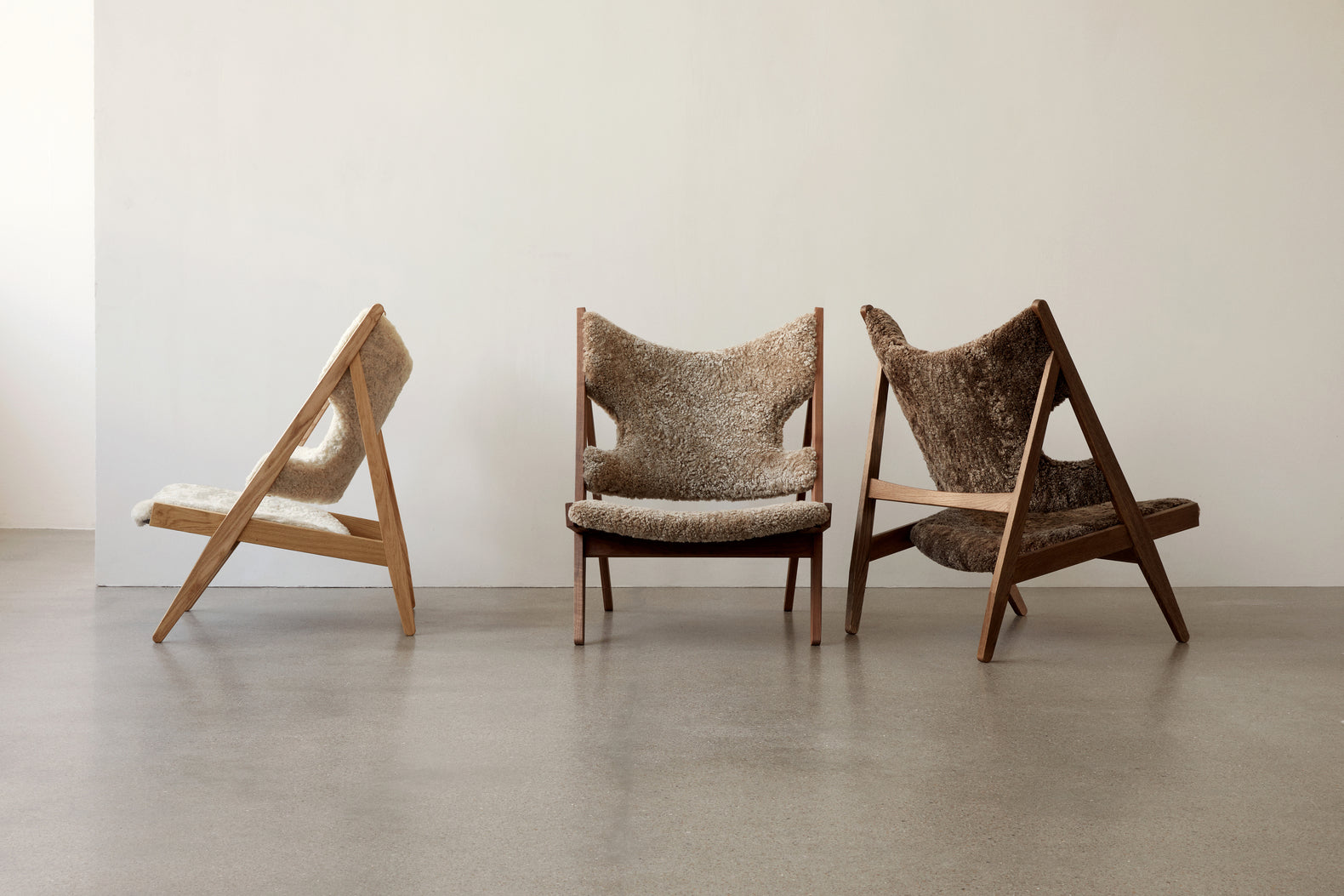 KNITTING armchair dark brown sheep leather with dark oak base