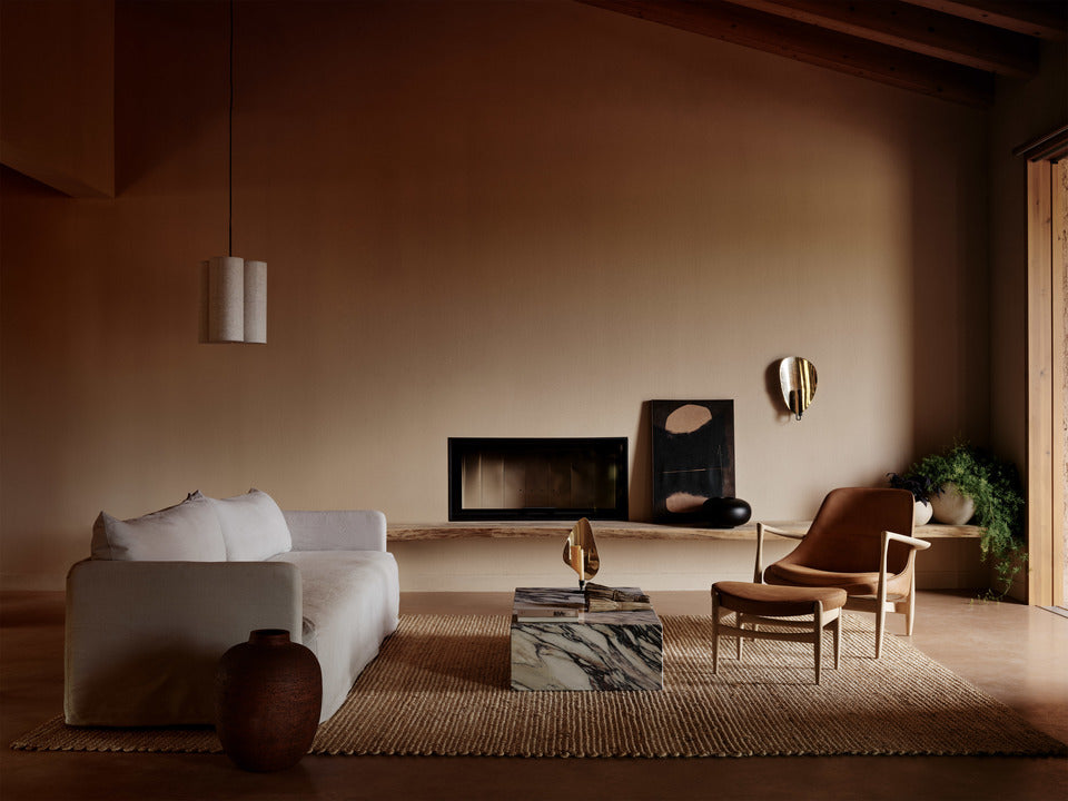 ELIZABETH footstool in cognac leather with an oak base