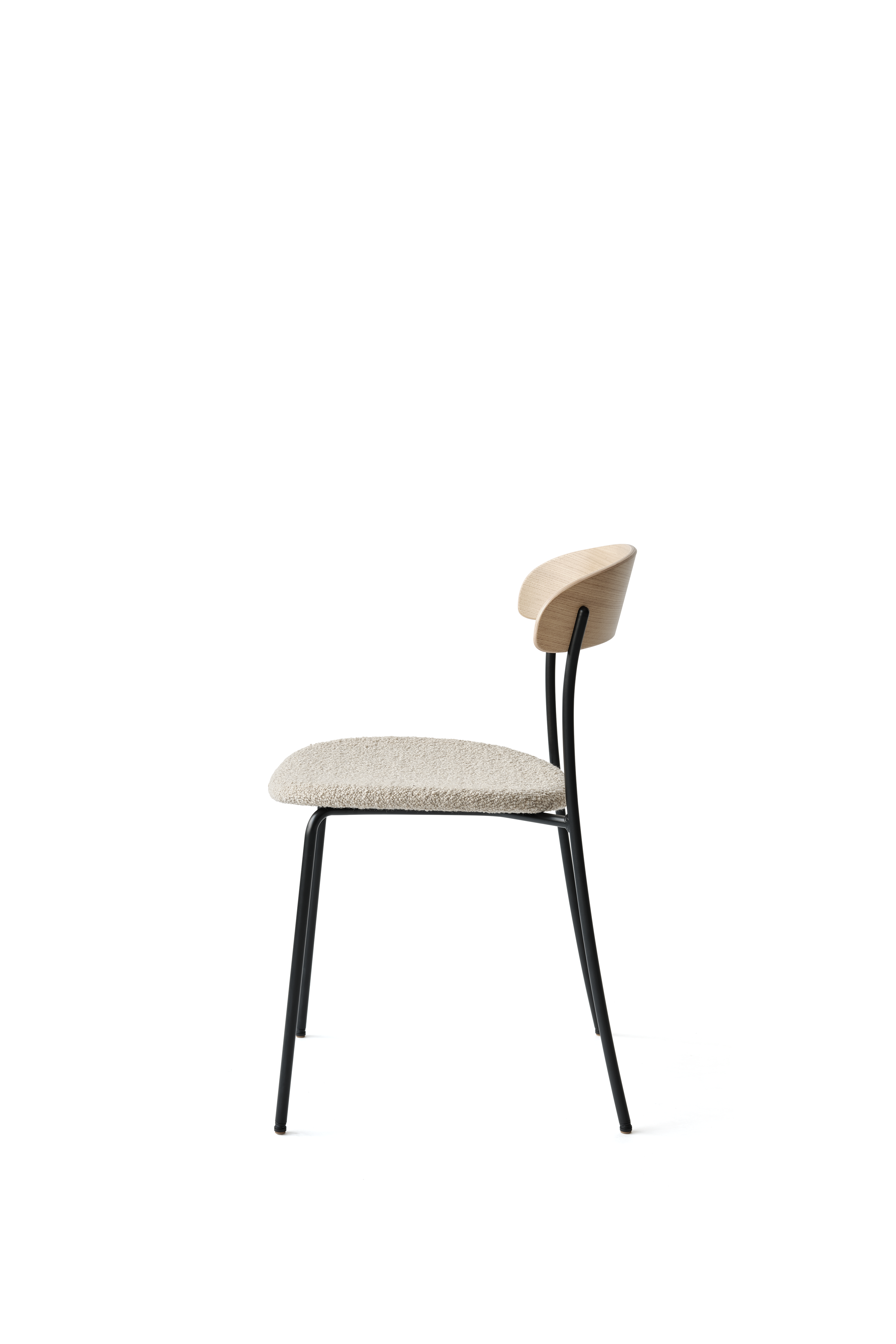 Missing chair upholstered with oak veneer