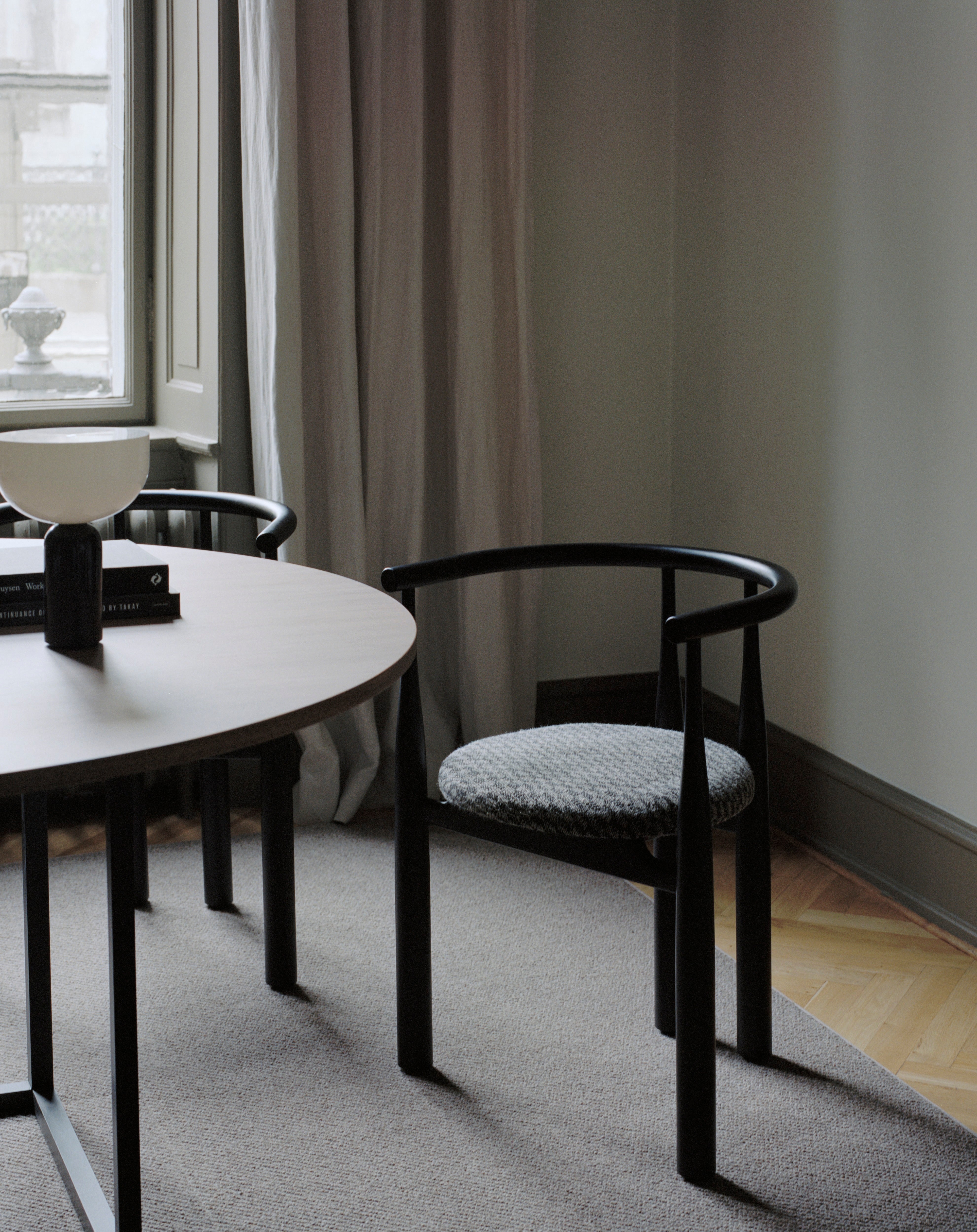 Bukowski chair upholstered with a black beech base