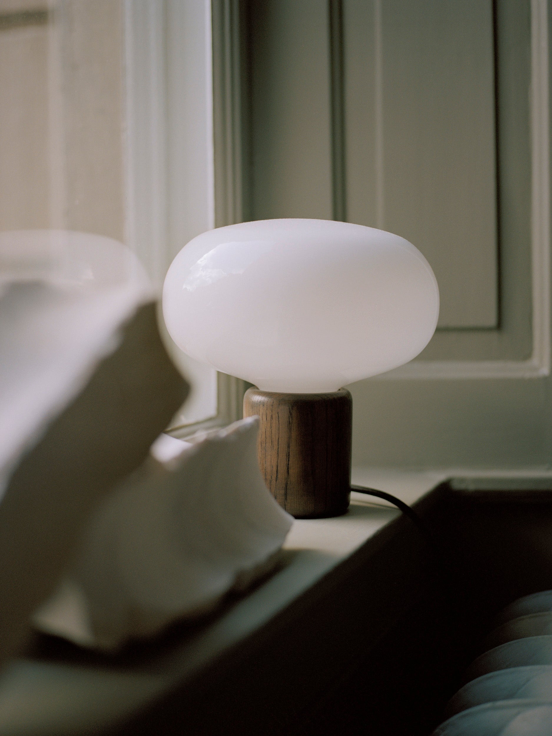 Karl-Johan table lamp iridescent glass with a smoked oak base