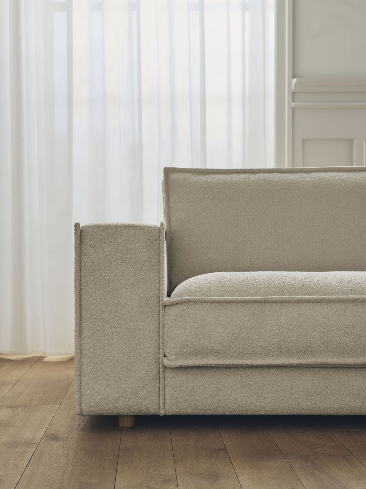 NOORA modular sofa - a left -hand module with an oak base