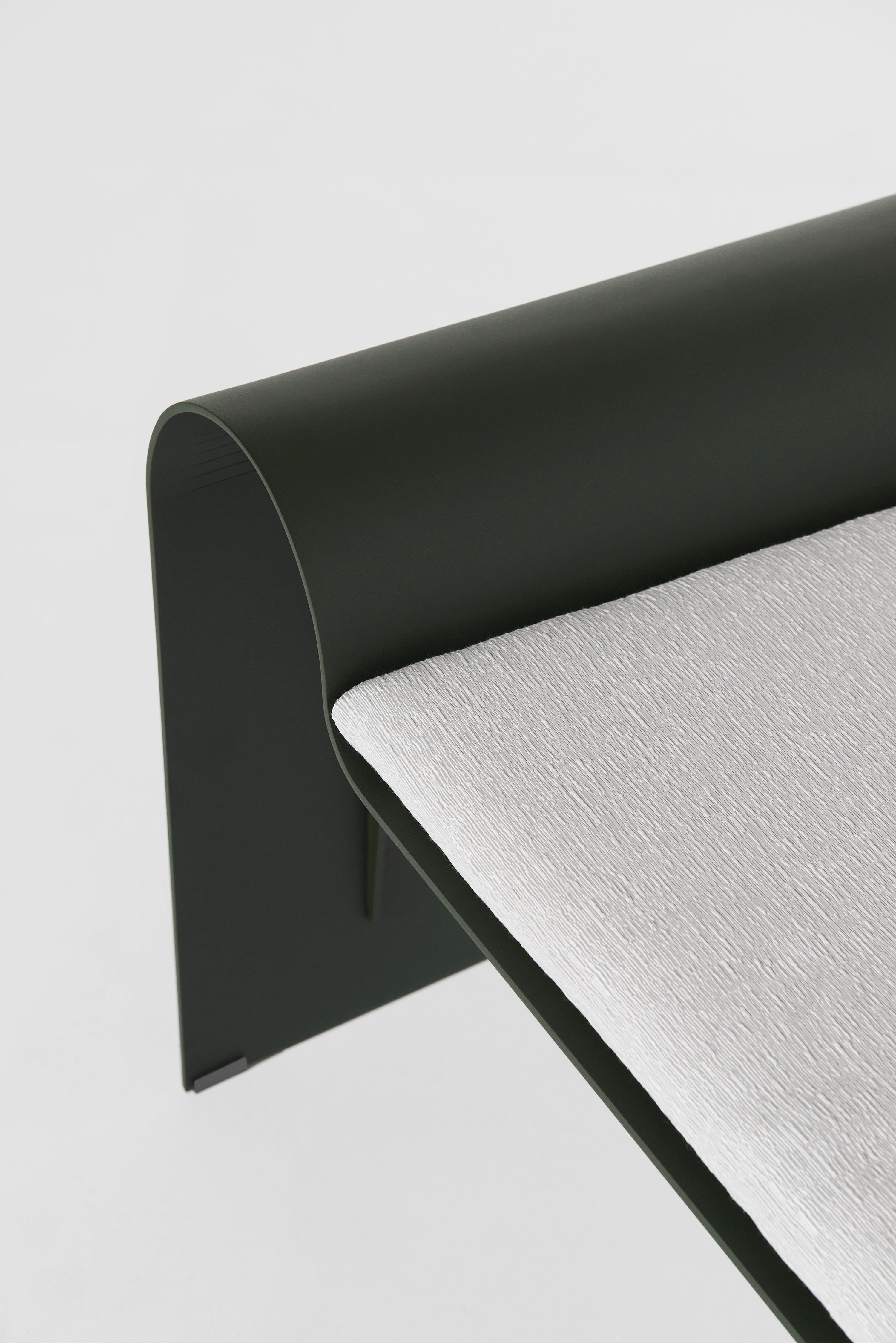 ECLIPSE bench in dark green with a gray cushion