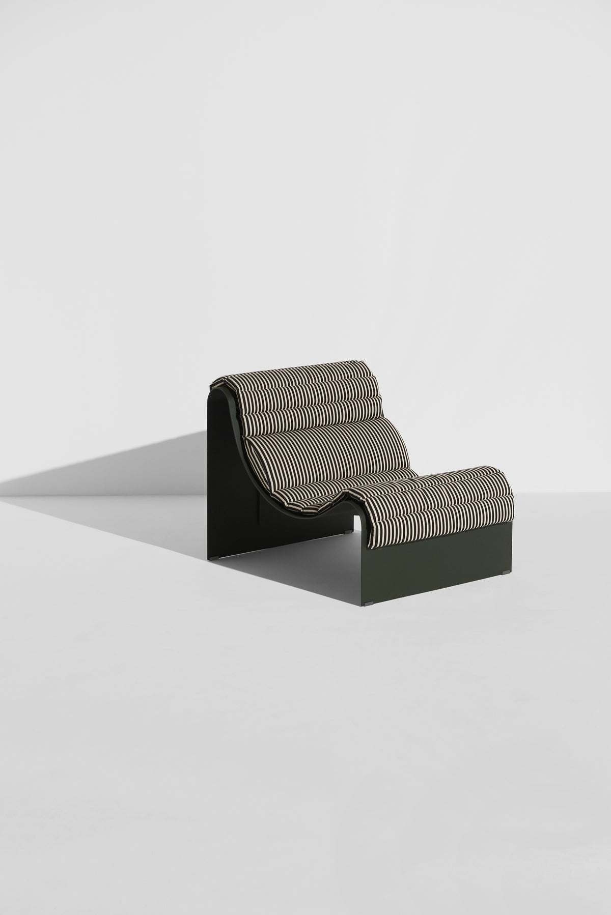 ECLIPSE Armchair in Dark Green with Striped Cushion