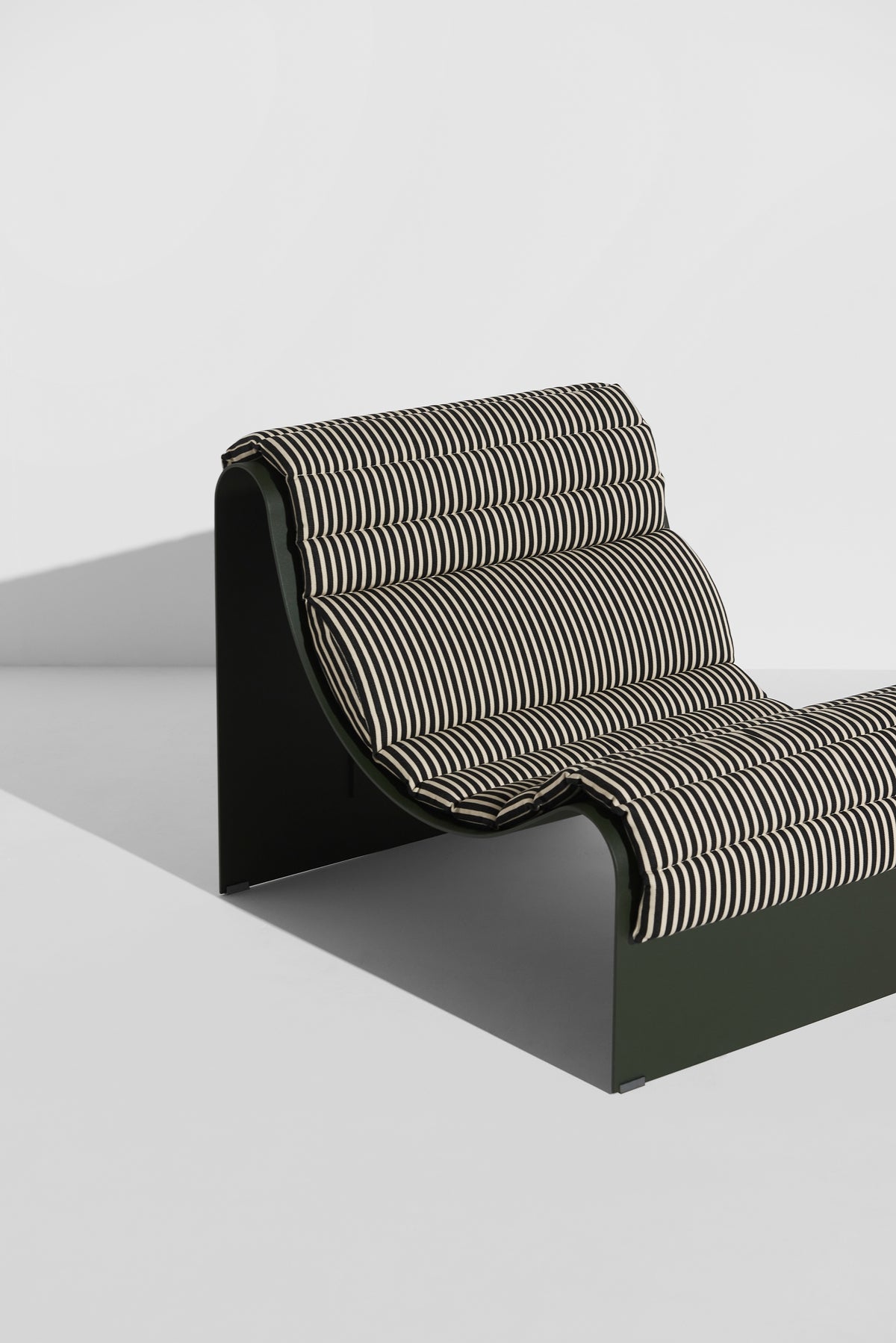 ECLIPSE Armchair in Dark Green with Striped Cushion