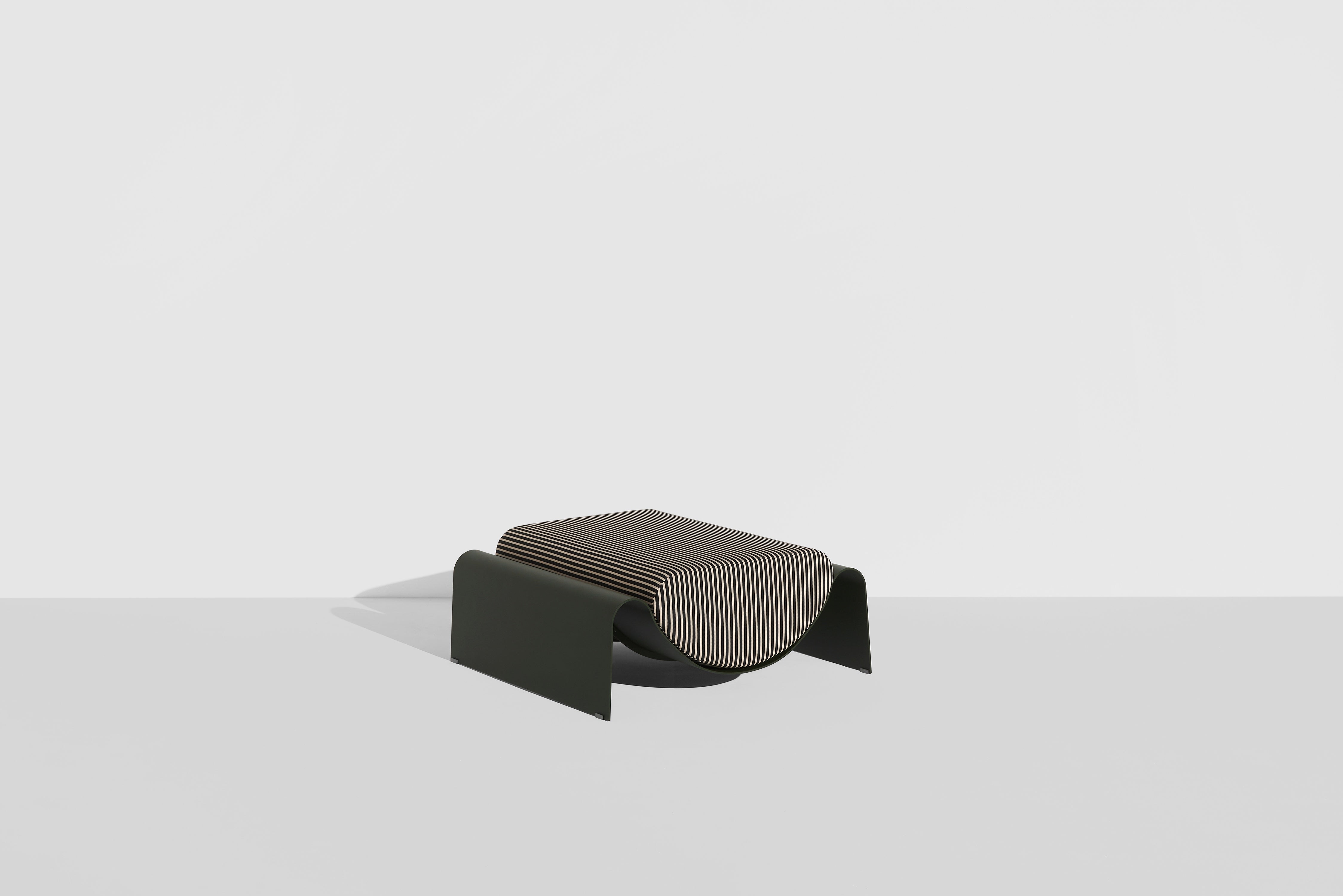 ECLIPSE pouf in dark green with a striped cushion