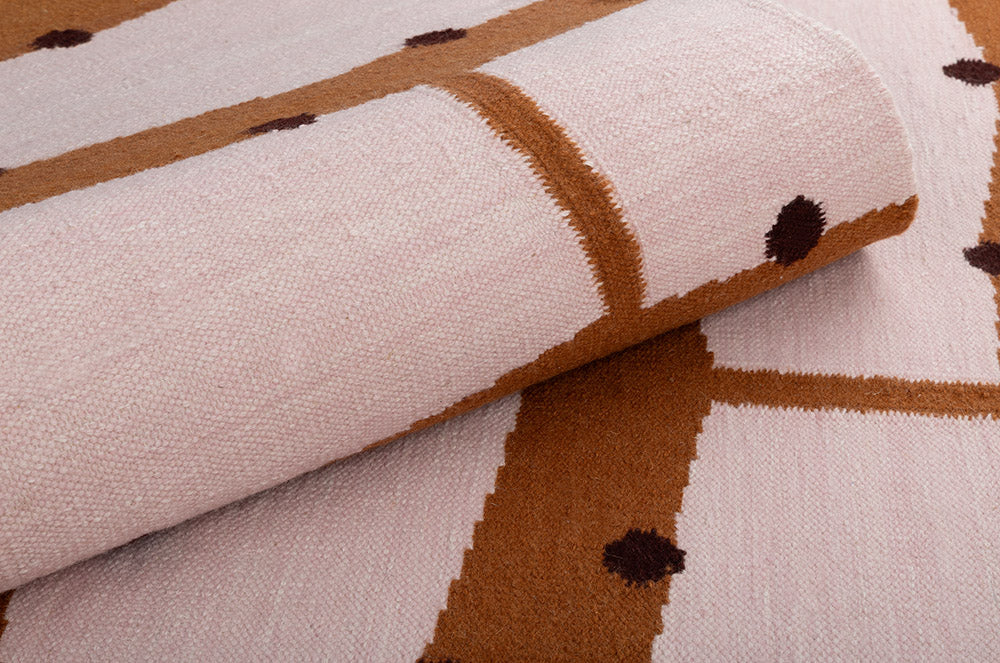 RIO Brick Fringe Rug in Black and Pink