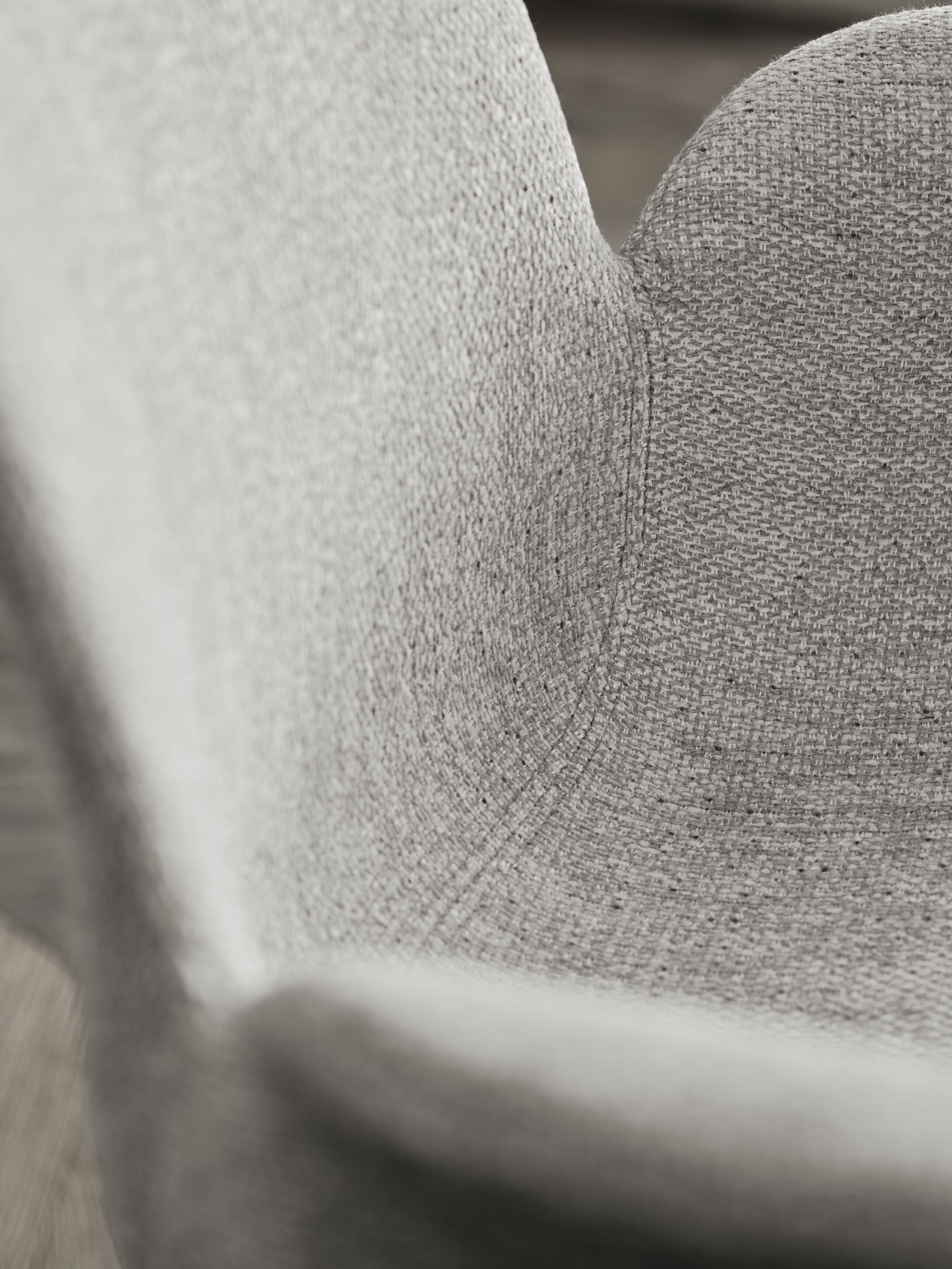 Chair with seed armrests upholstered with a gray base