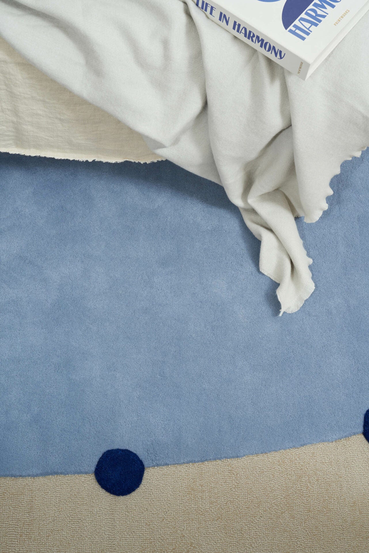 Beige ROME rug with cobalt and blue accents