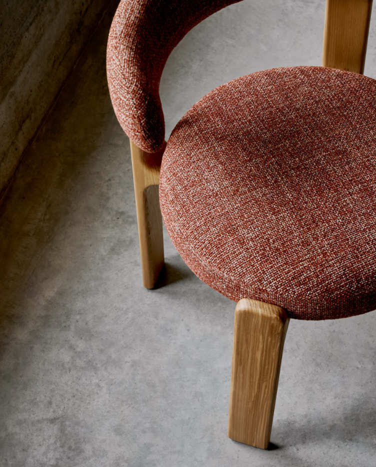 Red granite chair with a wooden base