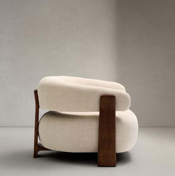 Beige granite armchair szenil with a dark wooden base