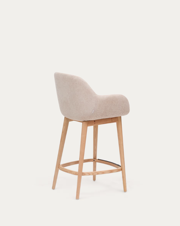 Beige riding chair with ash base