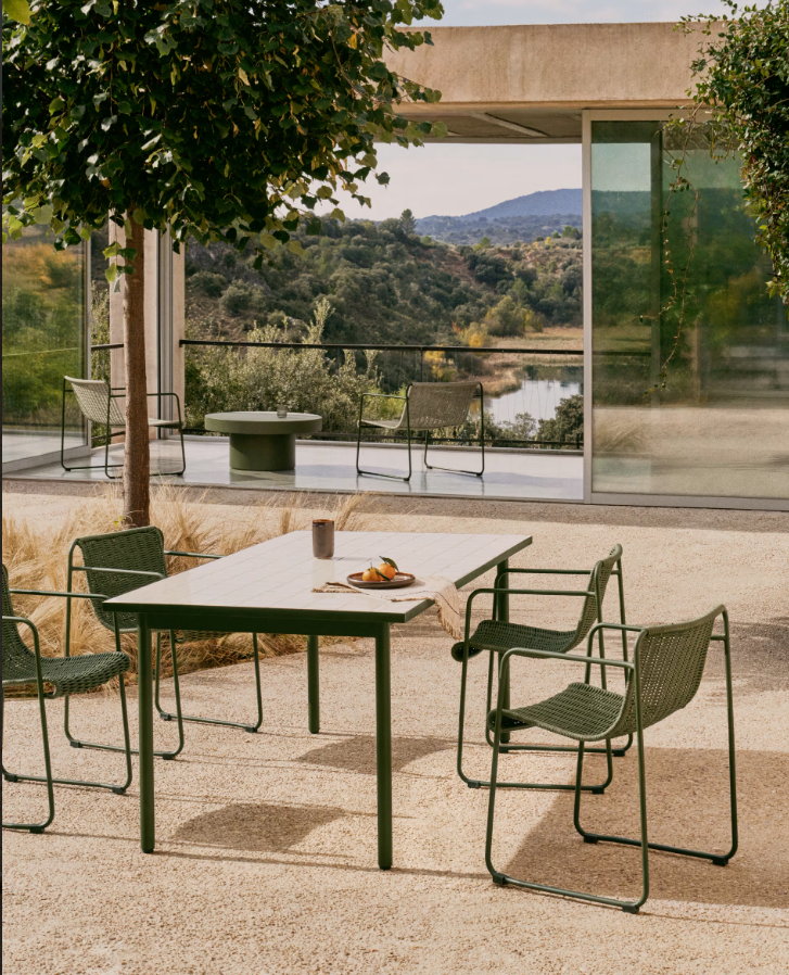 External chair Maurina Zielony with a green steel base