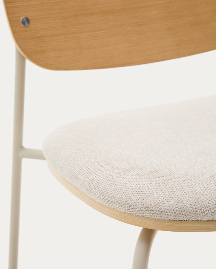 A chair of mela, poplar plywood with a beige szenil seat