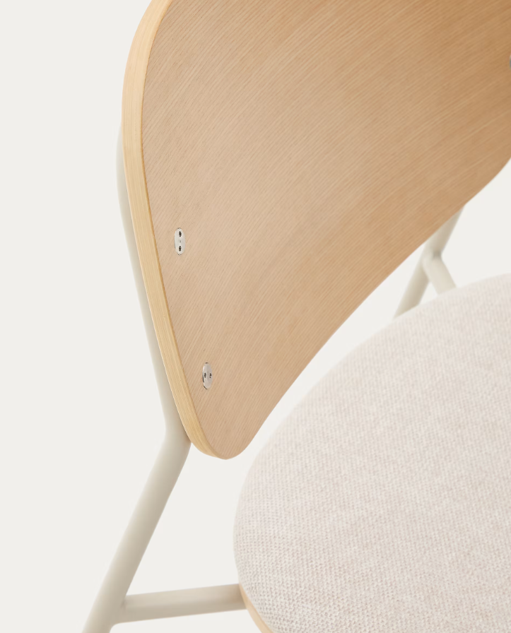 A chair of mela, poplar plywood with a beige szenil seat