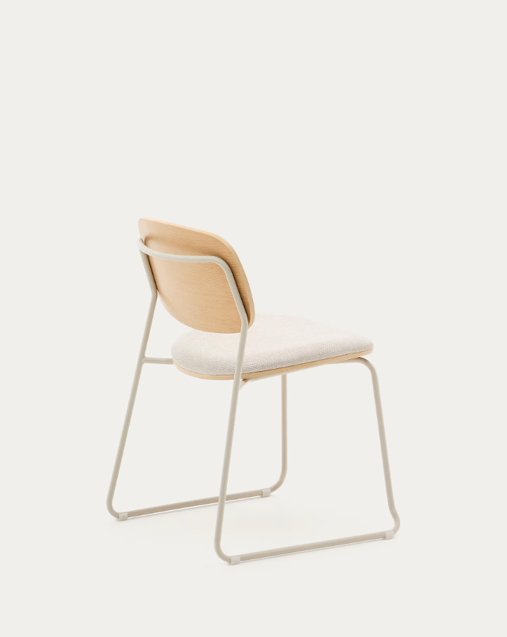 A chair of mela, poplar plywood with a beige szenil seat