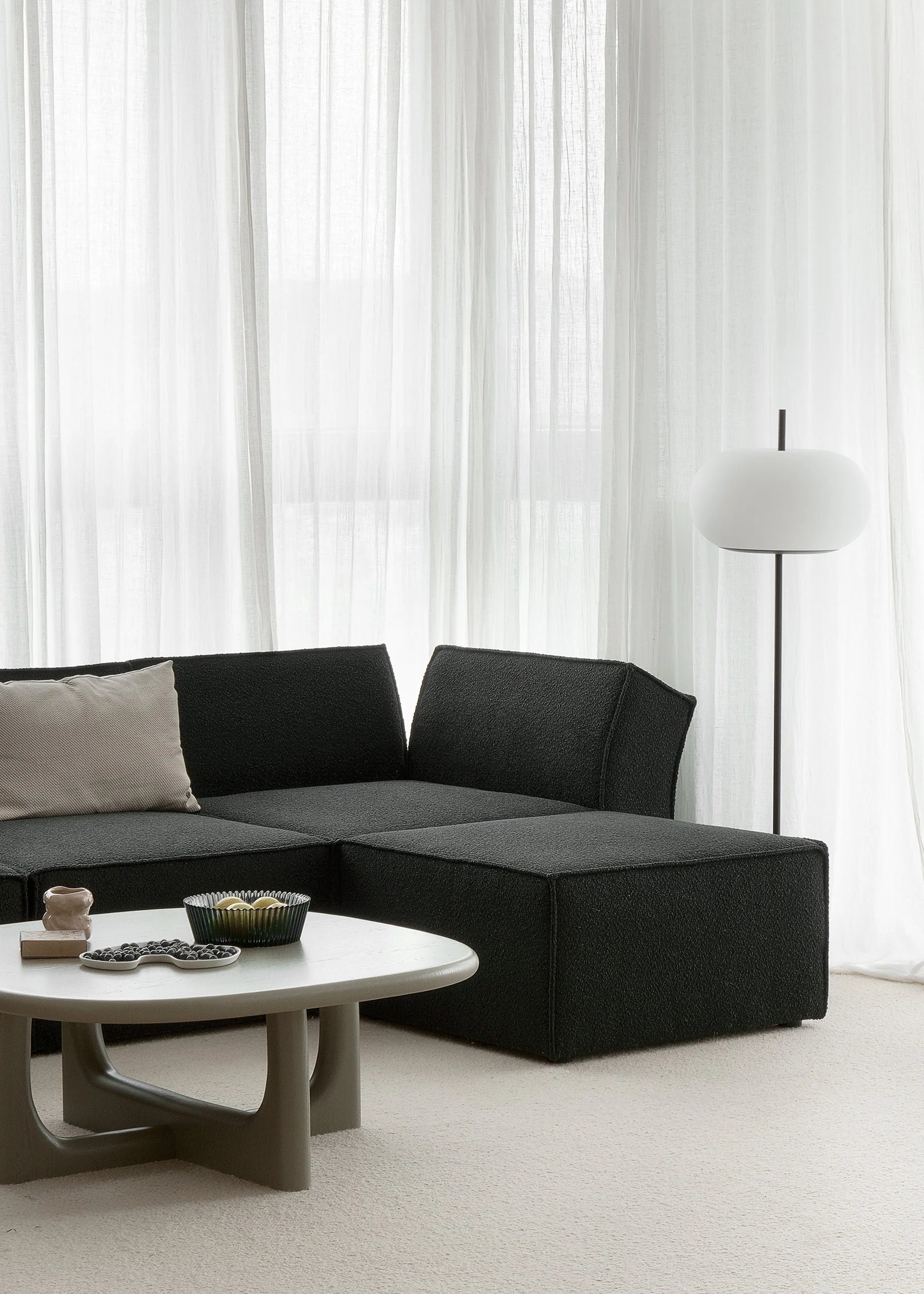 ANDO modular sofa - black boucle pouf