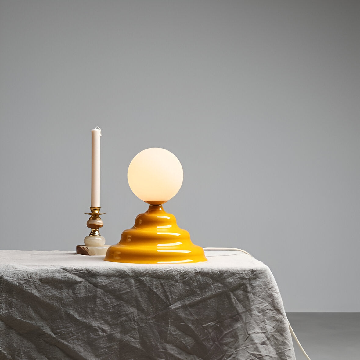 Table lamp with a glass lampshade yellow wave