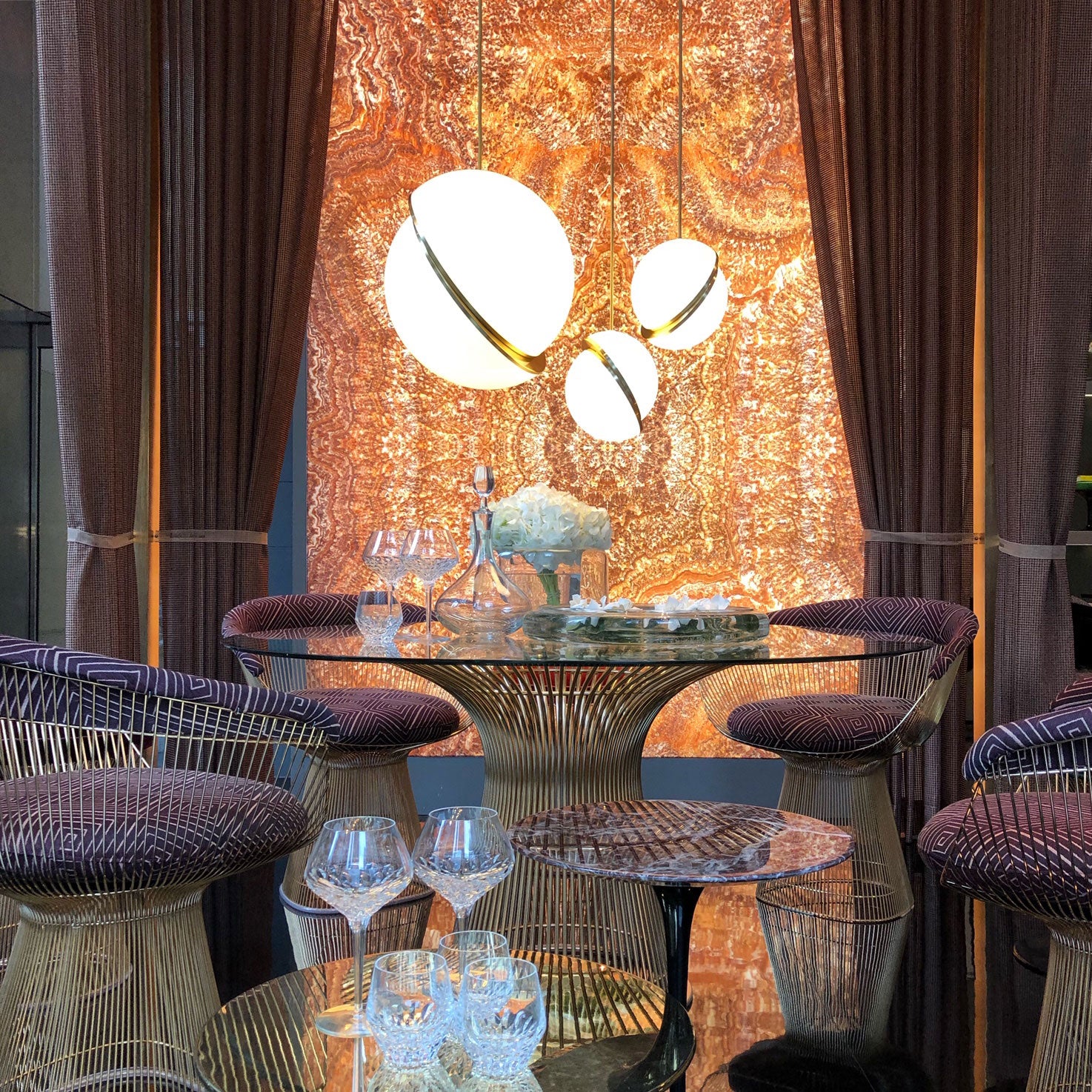 CRESCENT pendant lamp with an opal shade and brass accents.