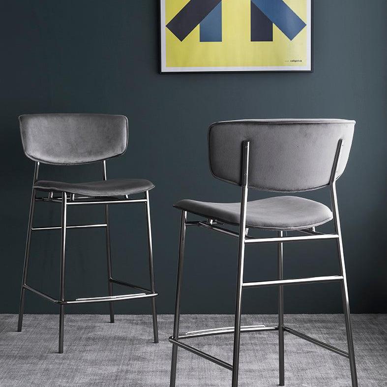 FIFTIES upholstered bar stool with a black base