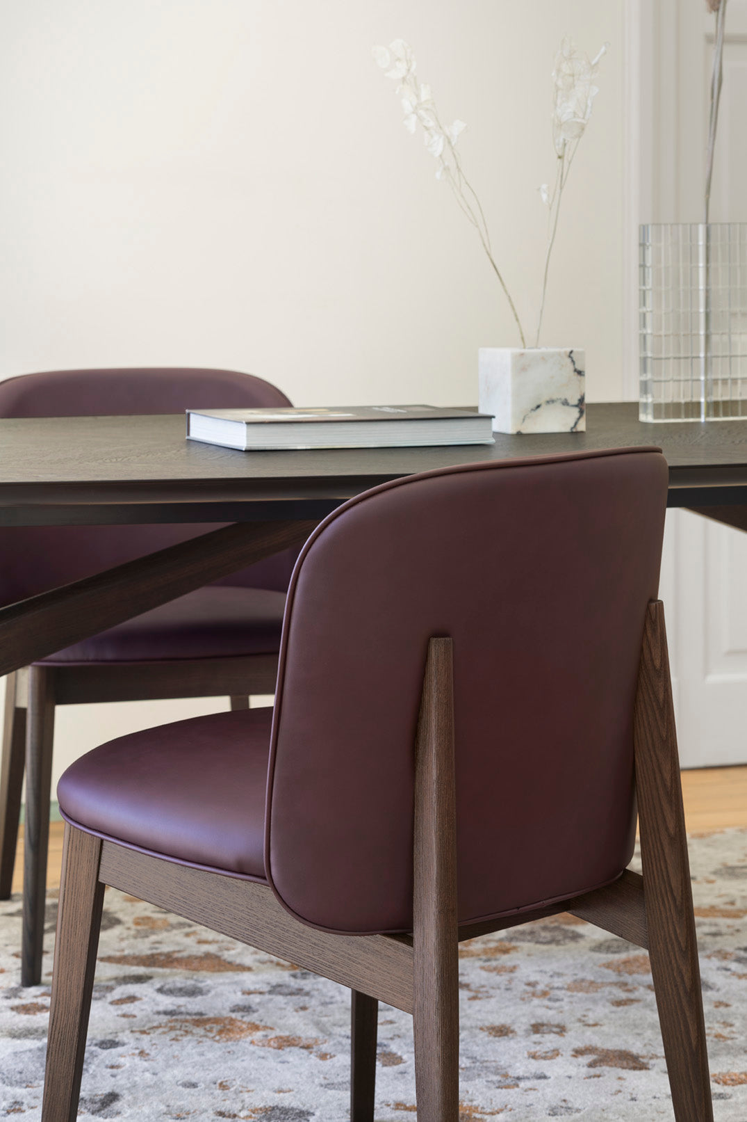 Armchair ABREY upholstered with a black wooden base