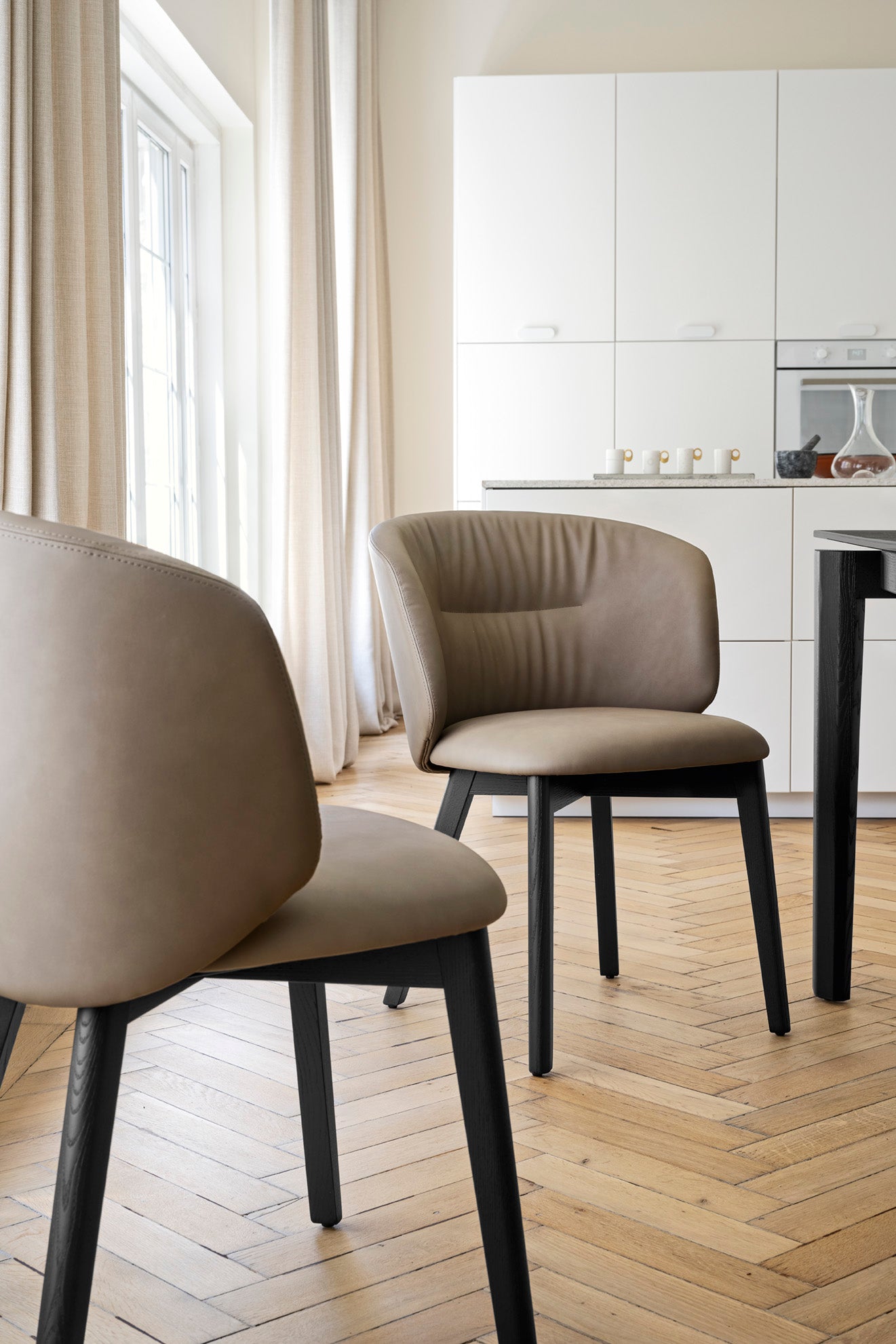 Upholstered SWEEL Chair with Black Wooden Base