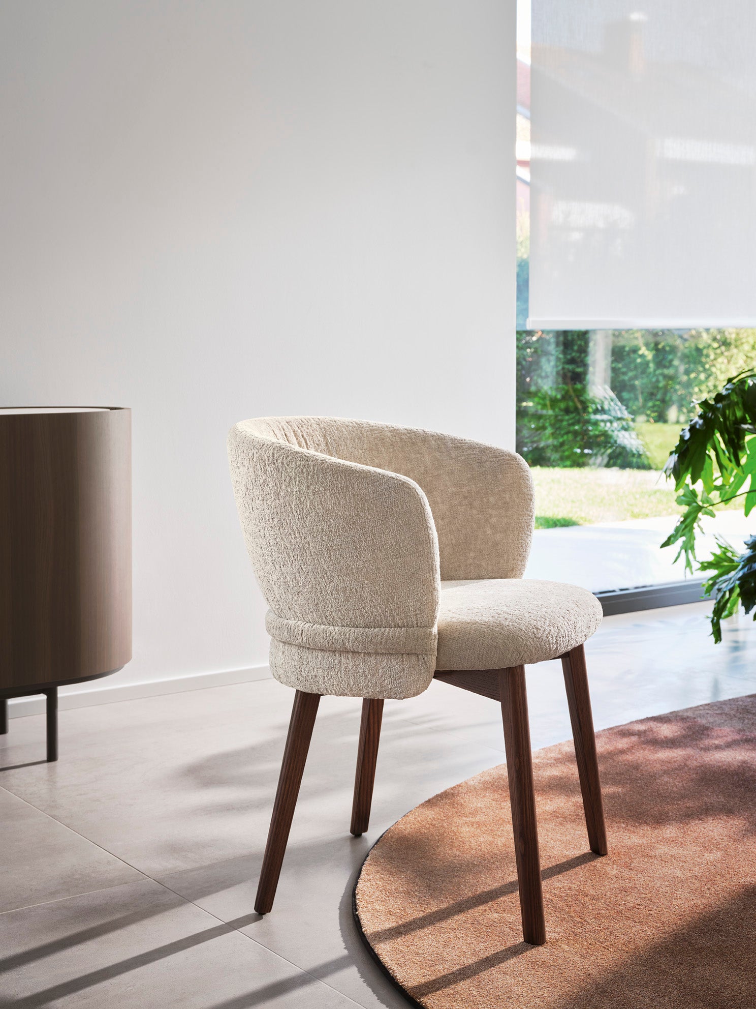 VANILLA upholstered chair with a dark wooden base