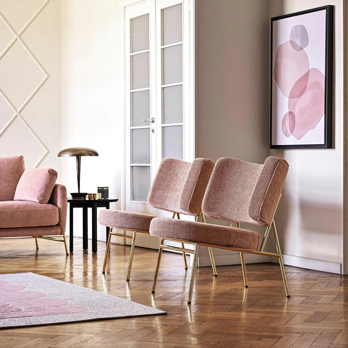 Upholstered COCO armchair with a golden base