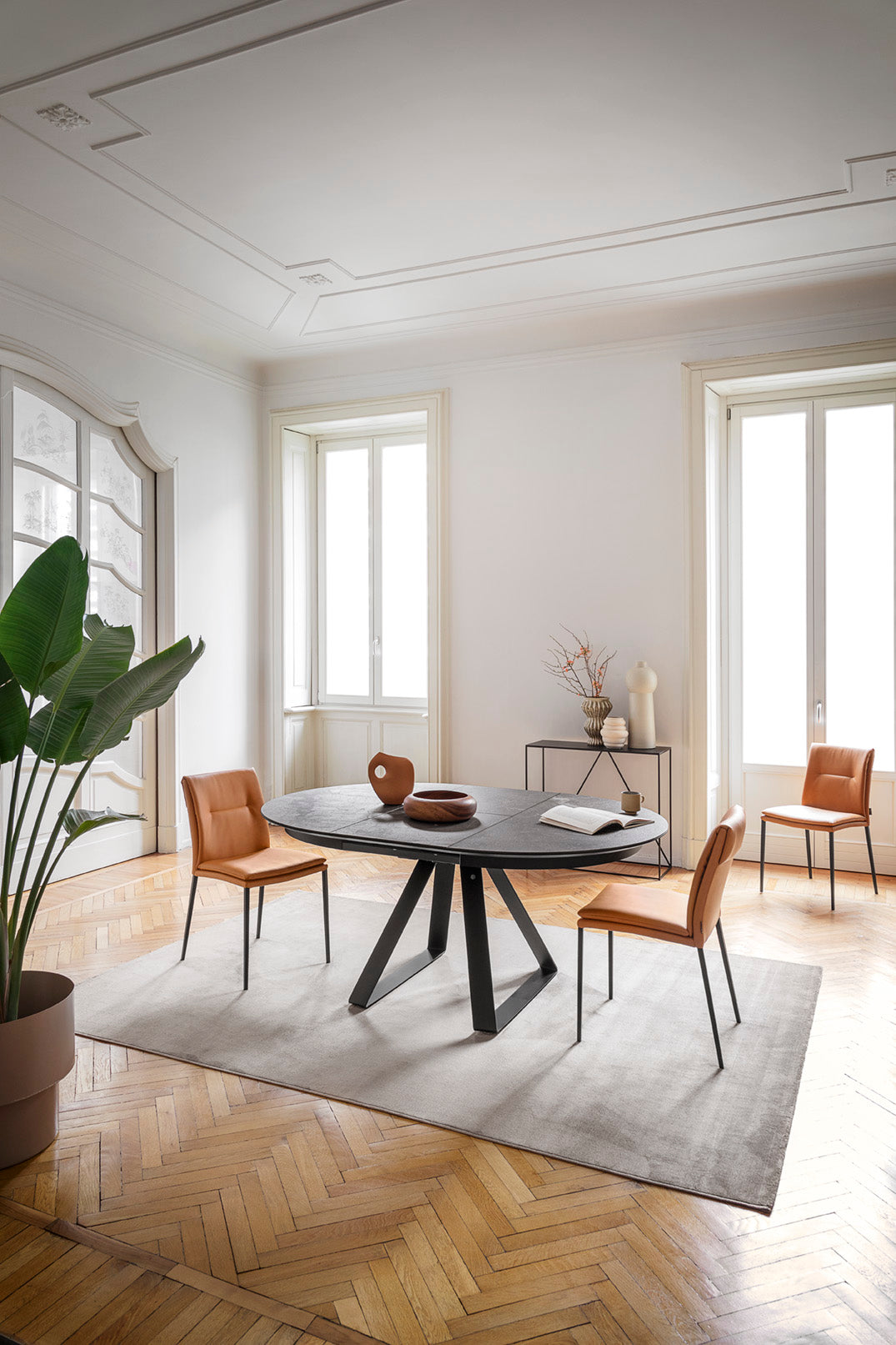 CARMEN LARGE upholstered chair with a brown base