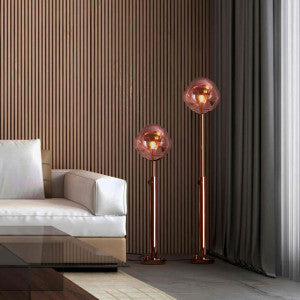 Melt Copper floor lamp with a copper base