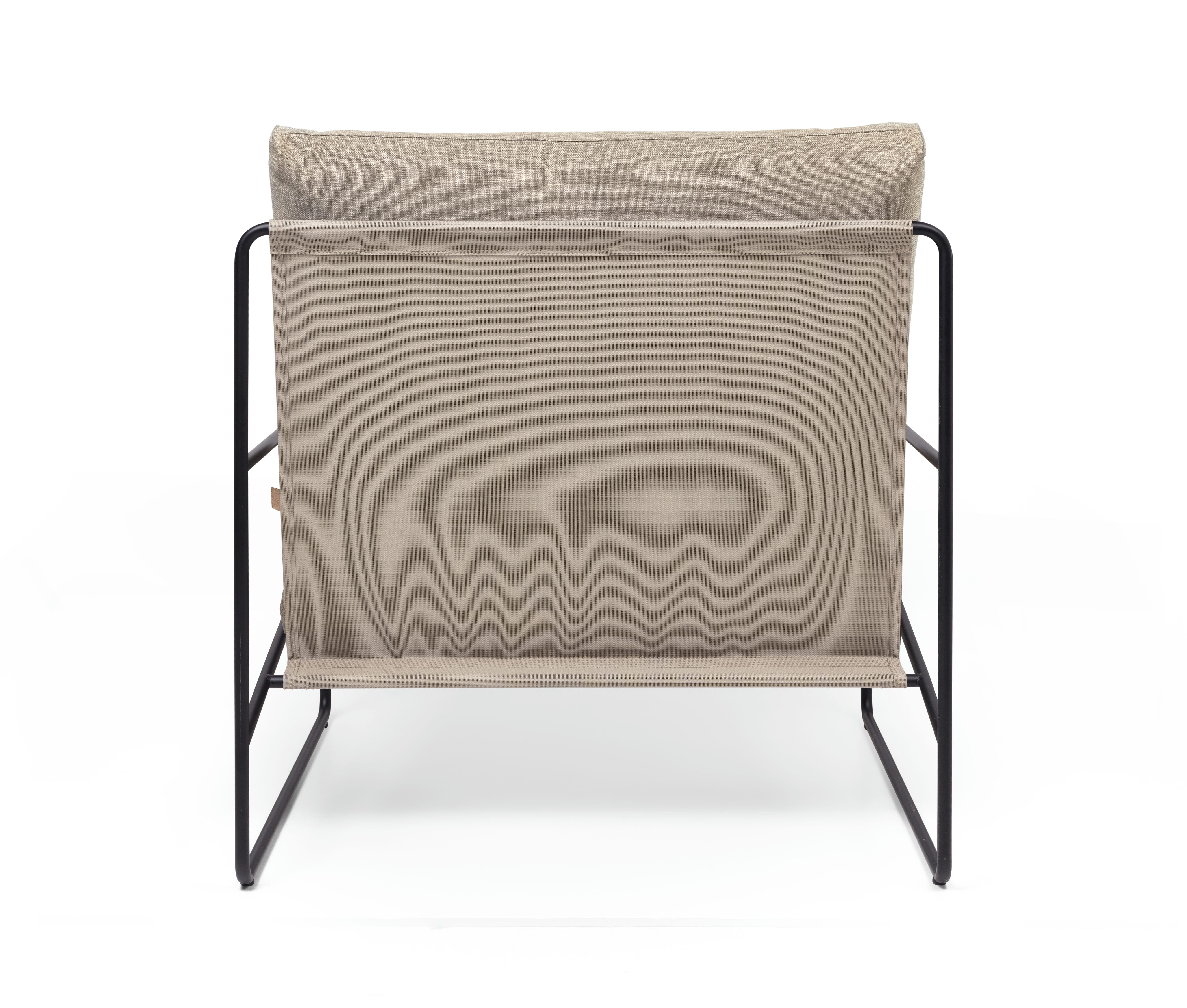 Desert beige external armchair with a black base