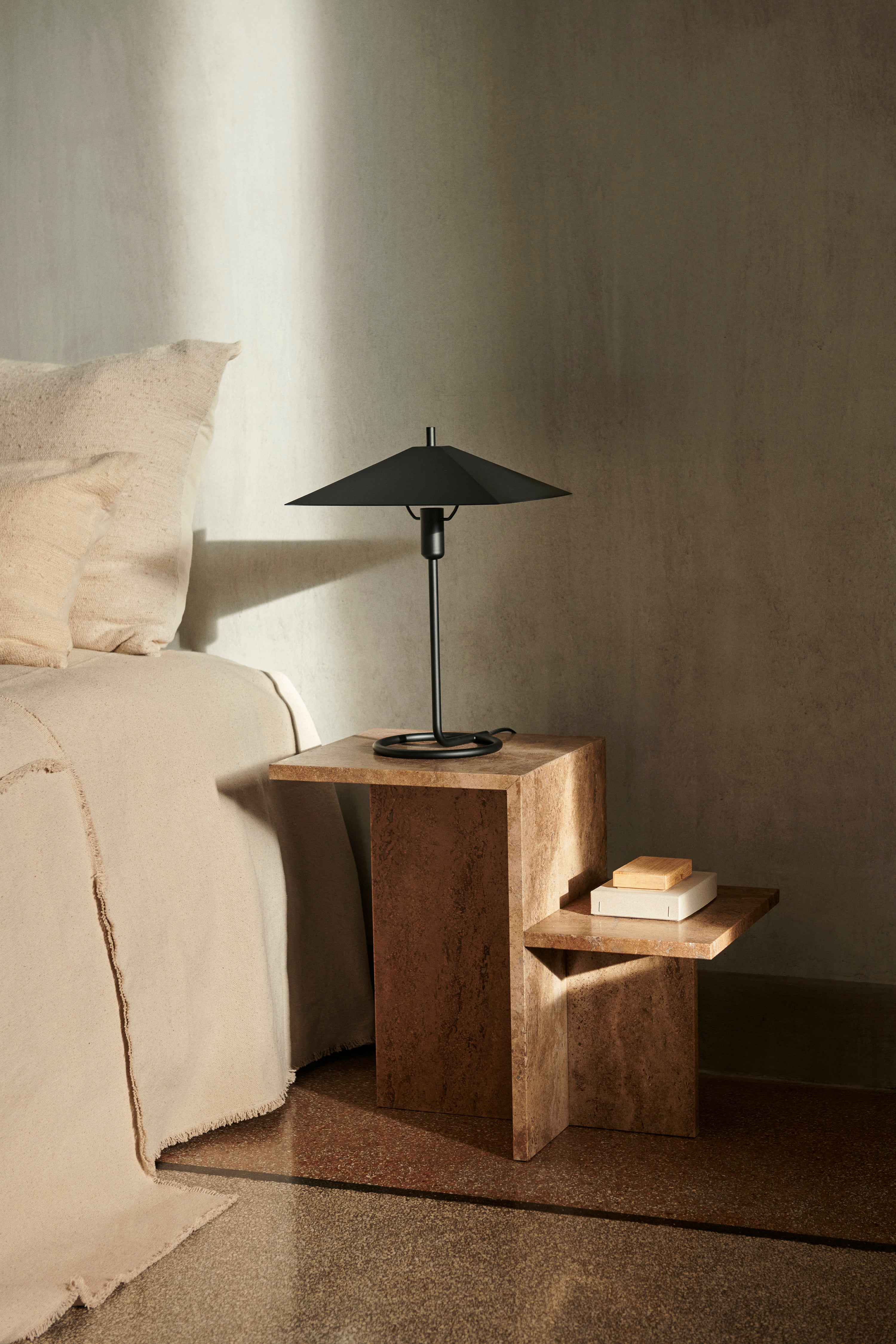 DISTINCT side table in dark brown travertine