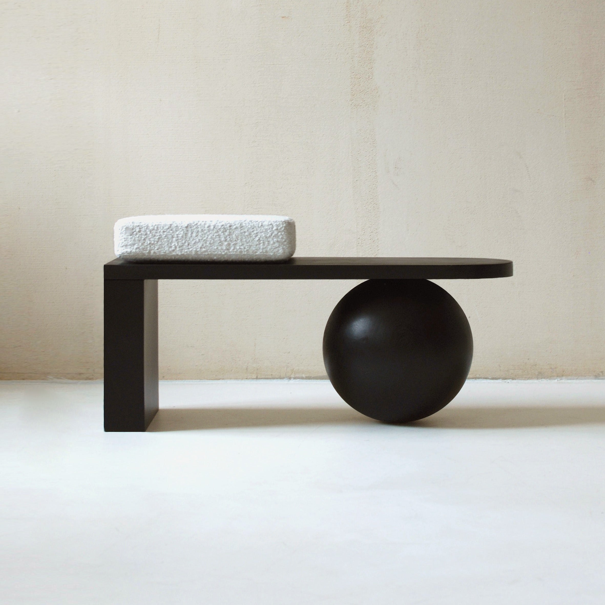 HEN bench made of wood and steel with an upholstered seat