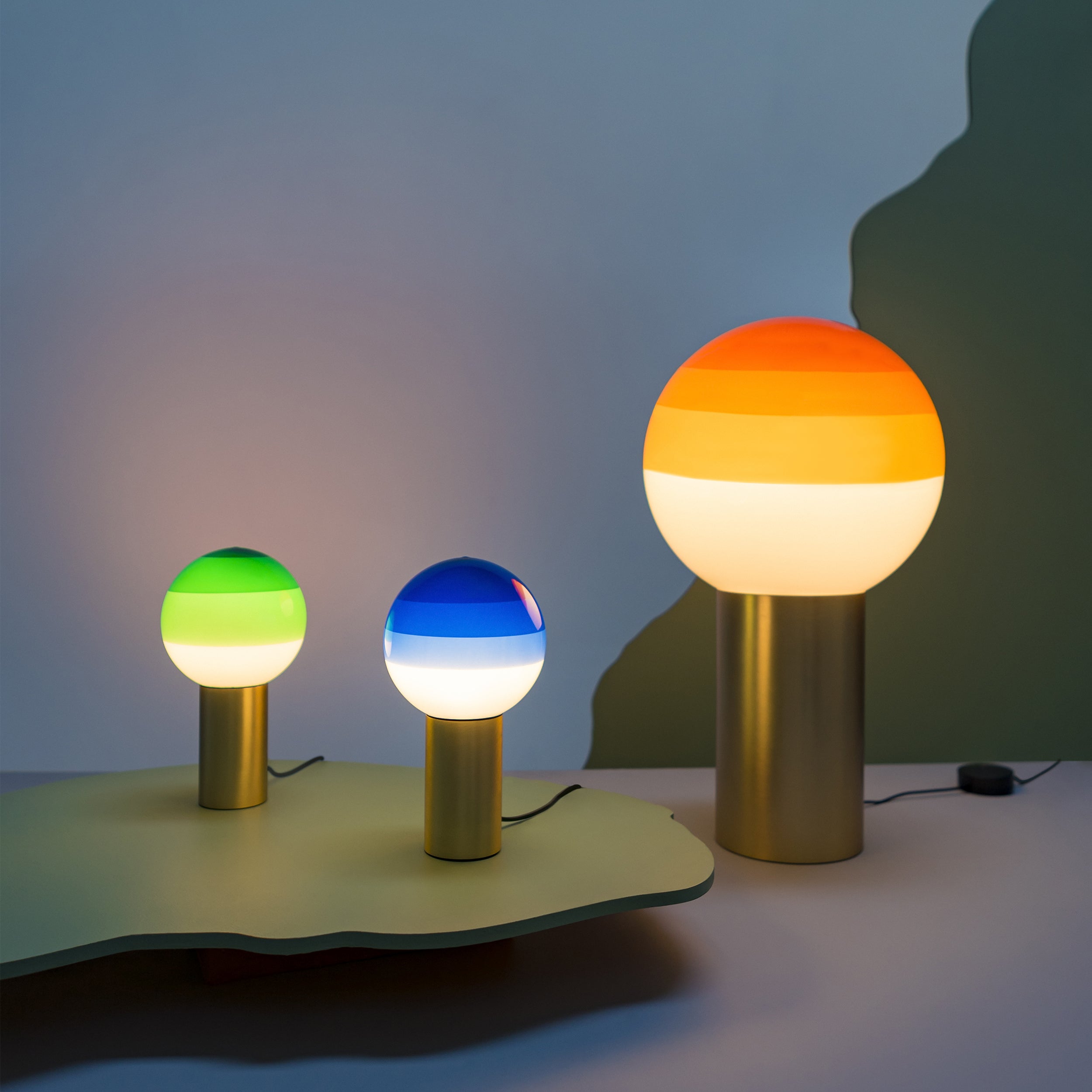 DIPPING green table lamp with a gold base