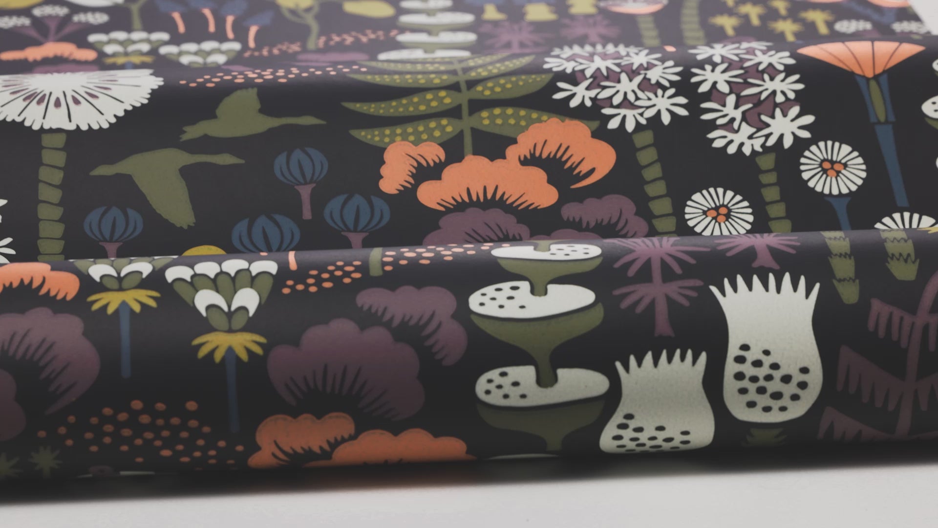 Non-woven paper wallpaper with a botanical pattern HANNA WERNING HOPPMOSSE black