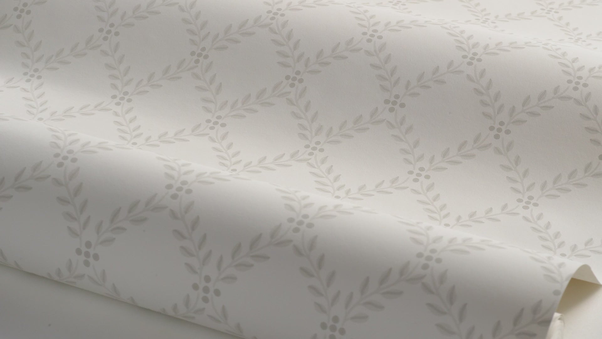 Wallpaper with a geometric plant pattern of leaves TRELLIS LEAVES beige
