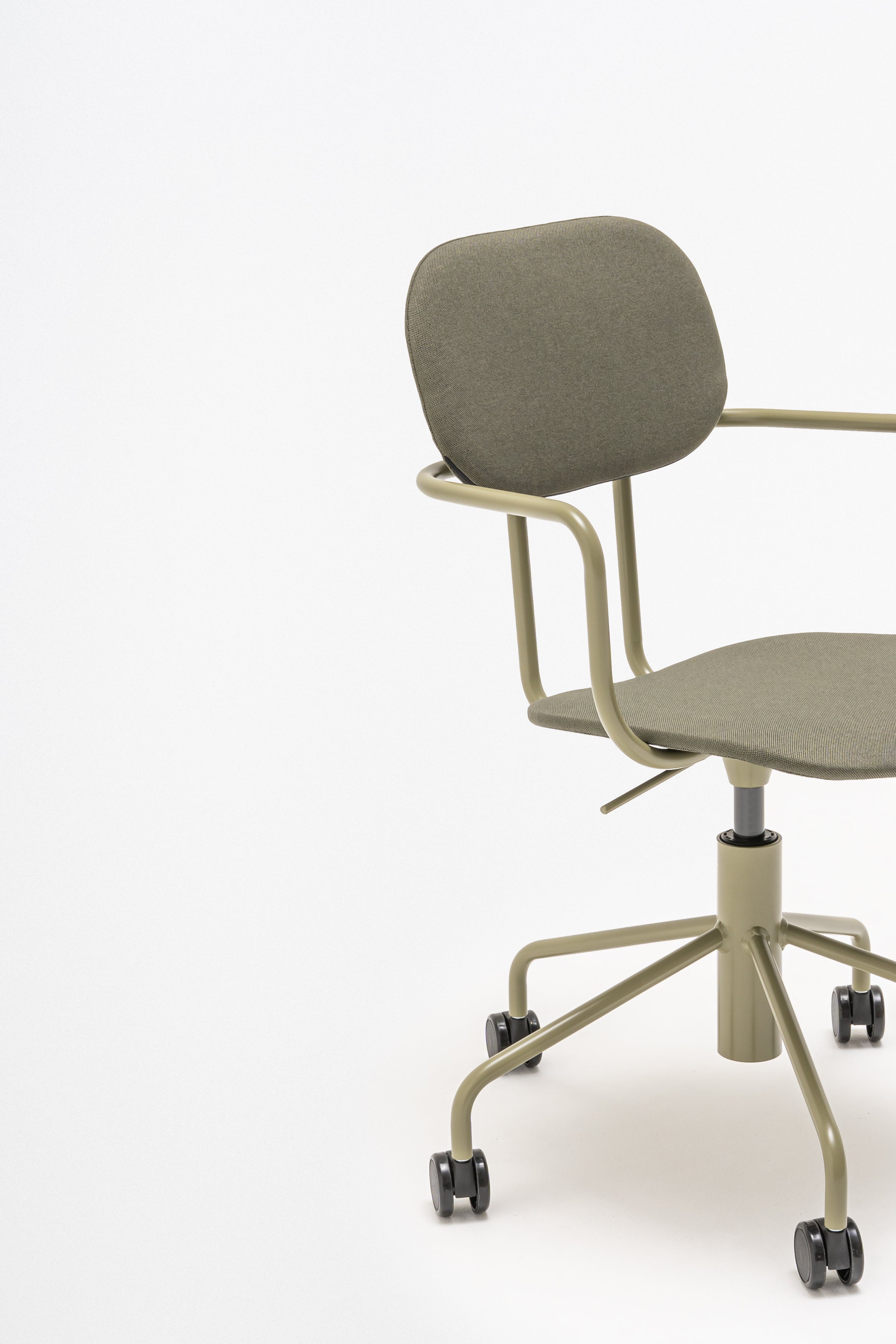 Office chair with adjustable new school base upholstered with wheels to the soft surface