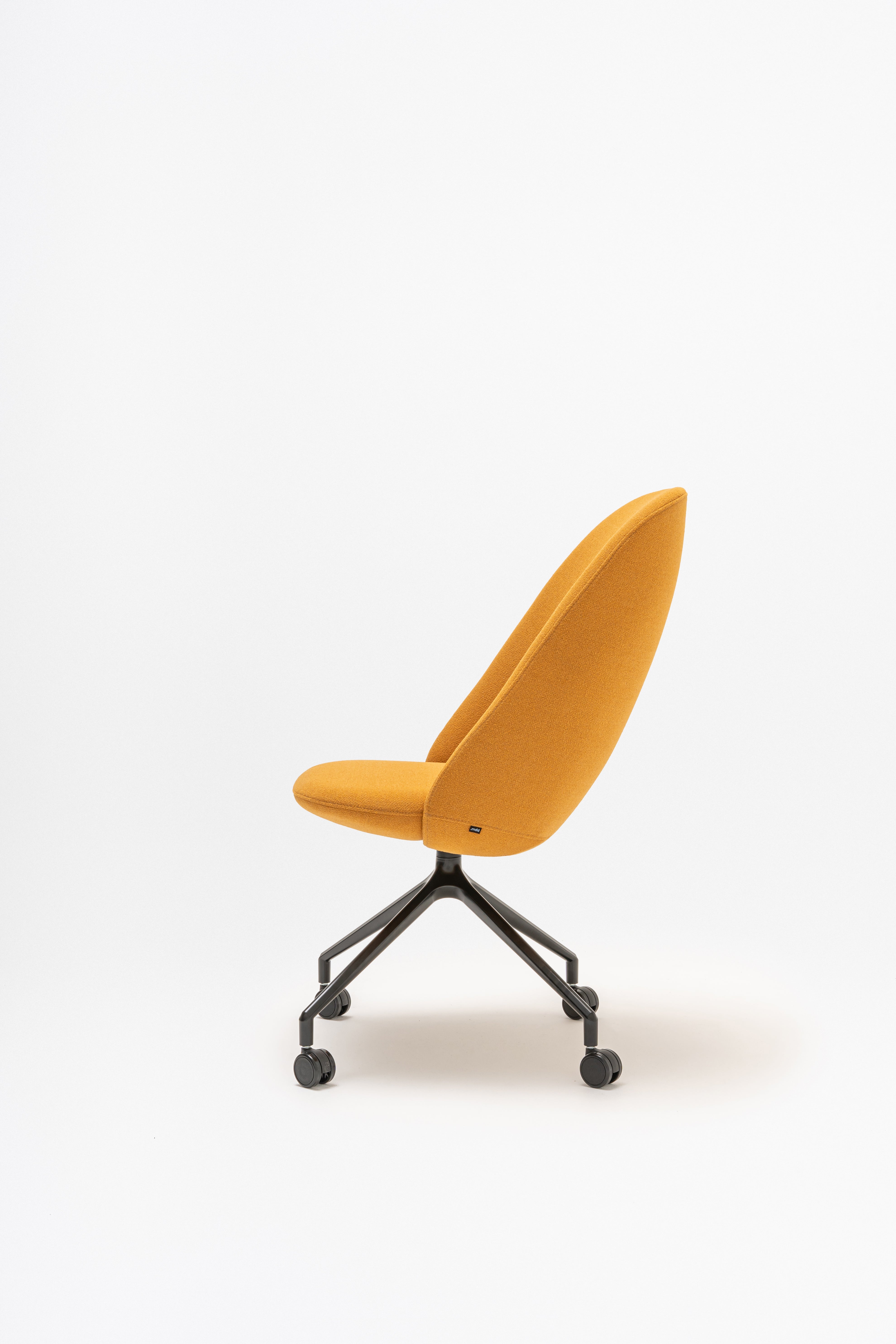 Rotable armchair with a high back parallel metal base with wheels to a hard surface