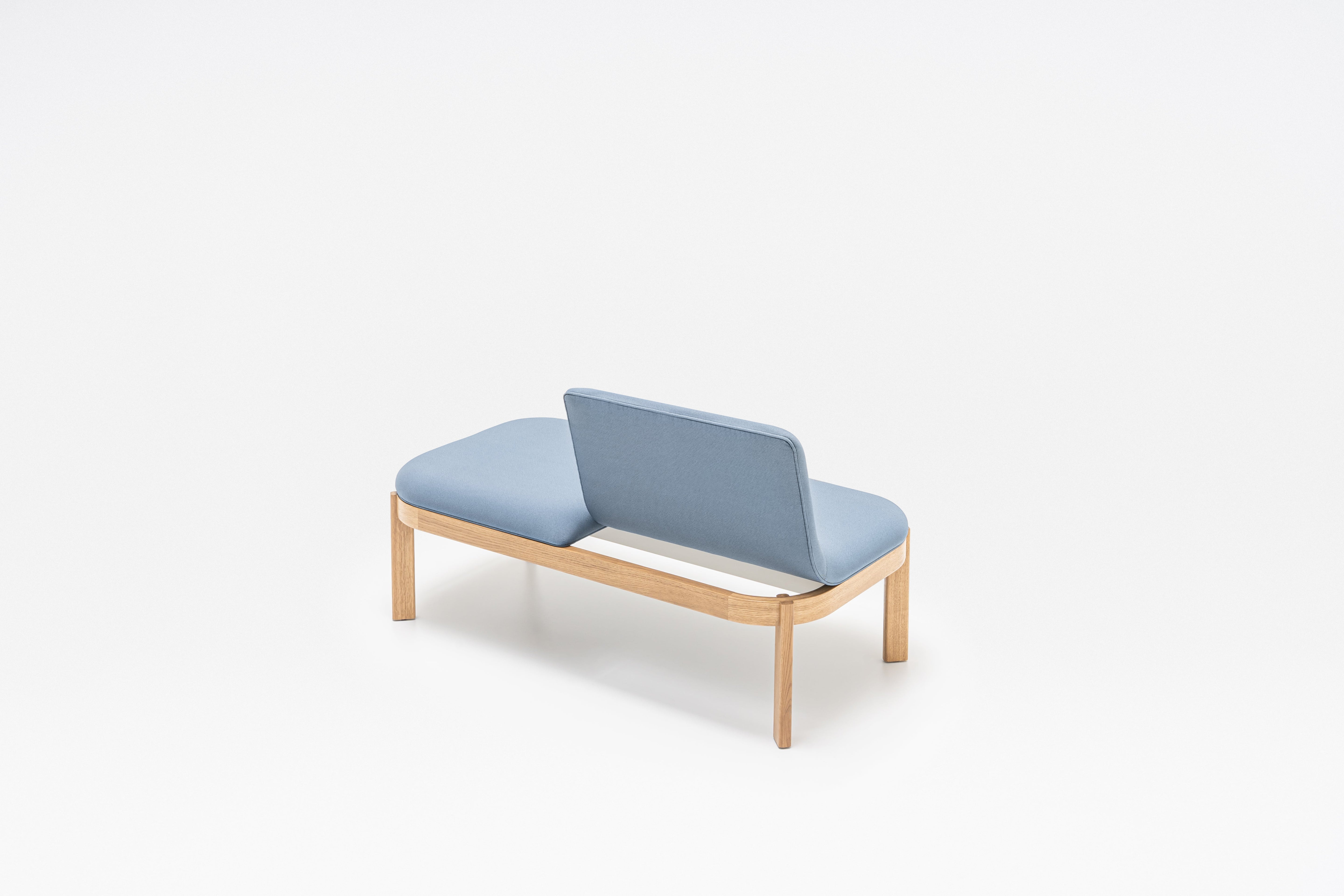 Upholstered bench with ramps of the wooden base