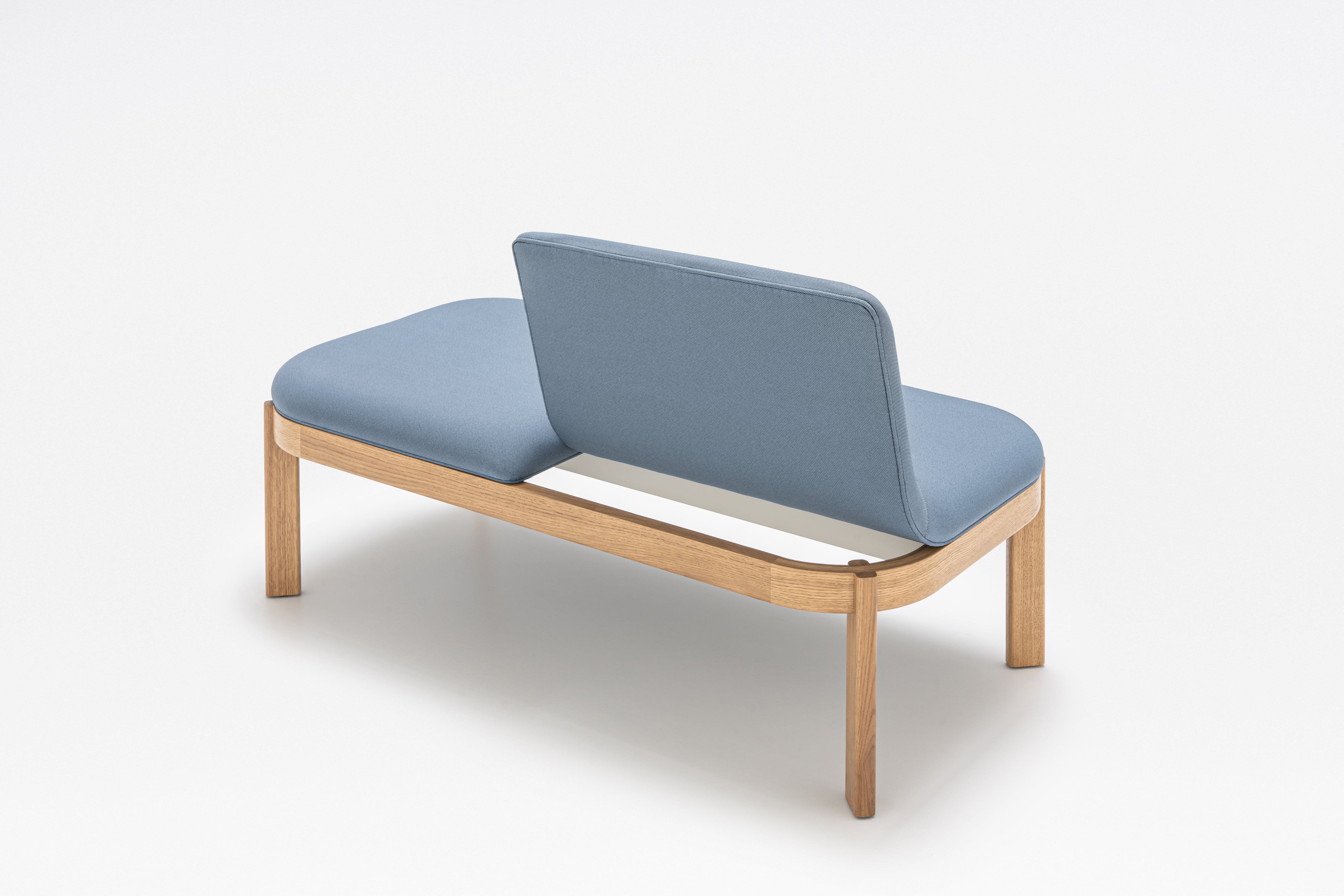 Upholstered bench with ramps of the wooden base