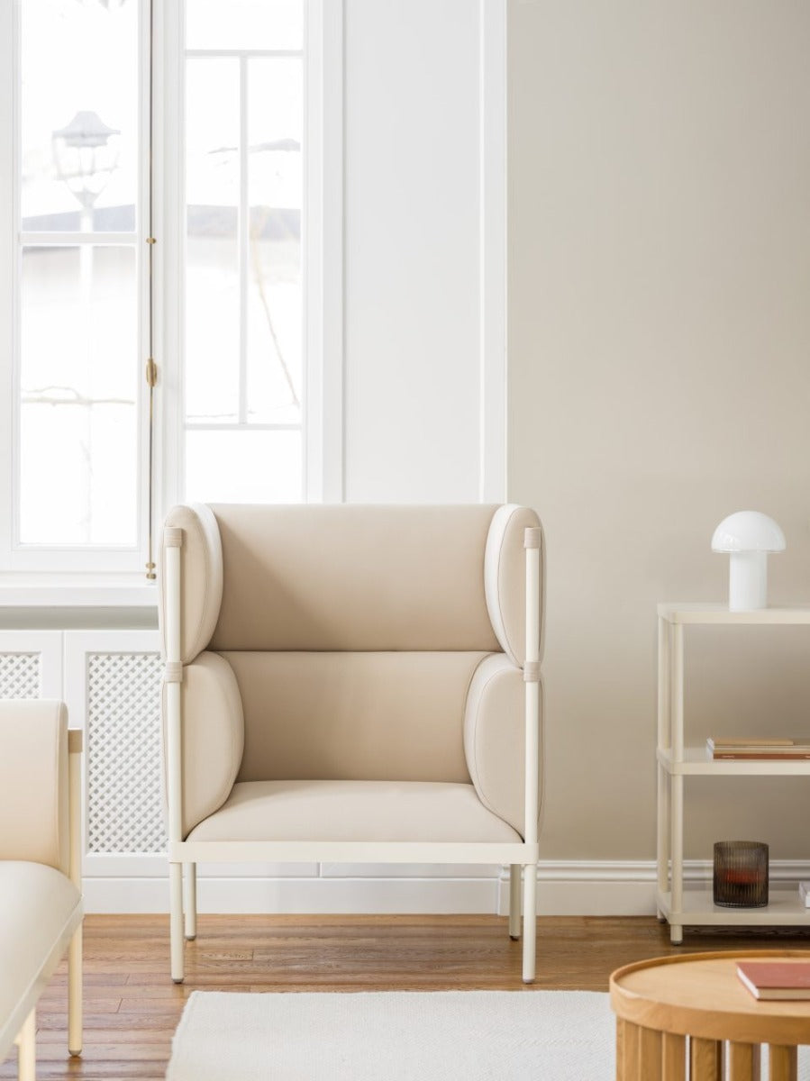 High armchair upholstered stilt