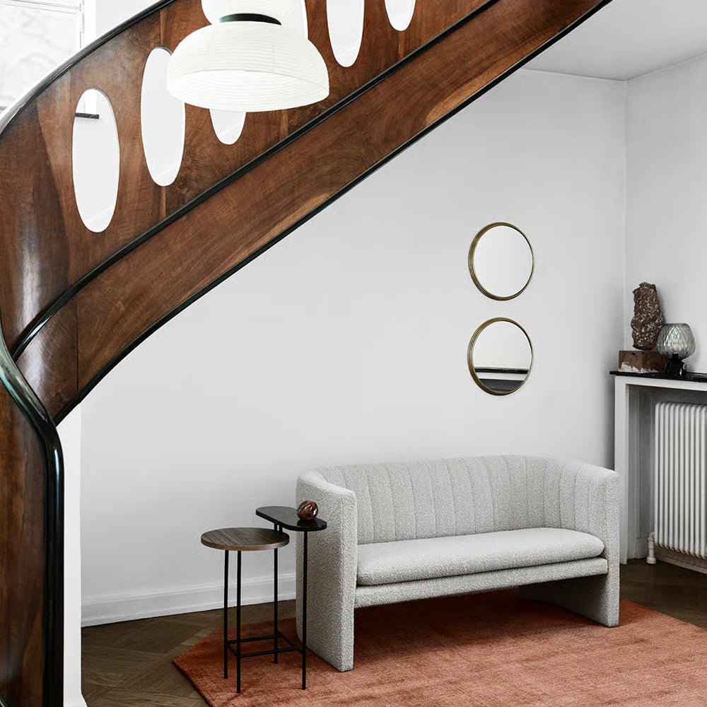 Round wall mirror SILLON with a brass frame