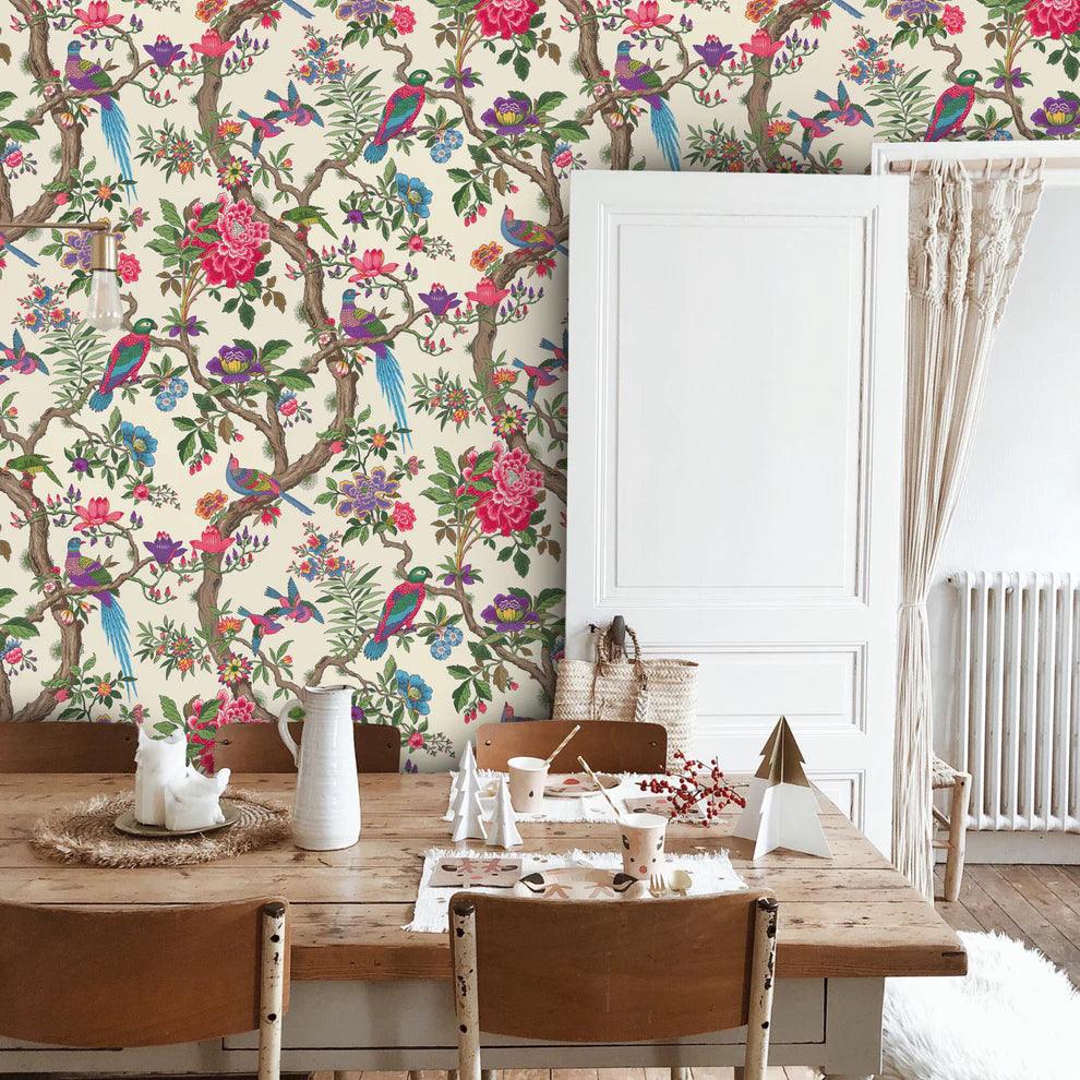 Wallpaper with a plant and animal motif of birds FOLIE - Fontainebleau light green
