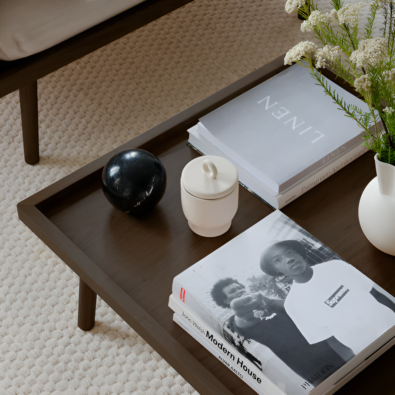 Lounge Around Shuffle Puff in anthracite with a dark oak base