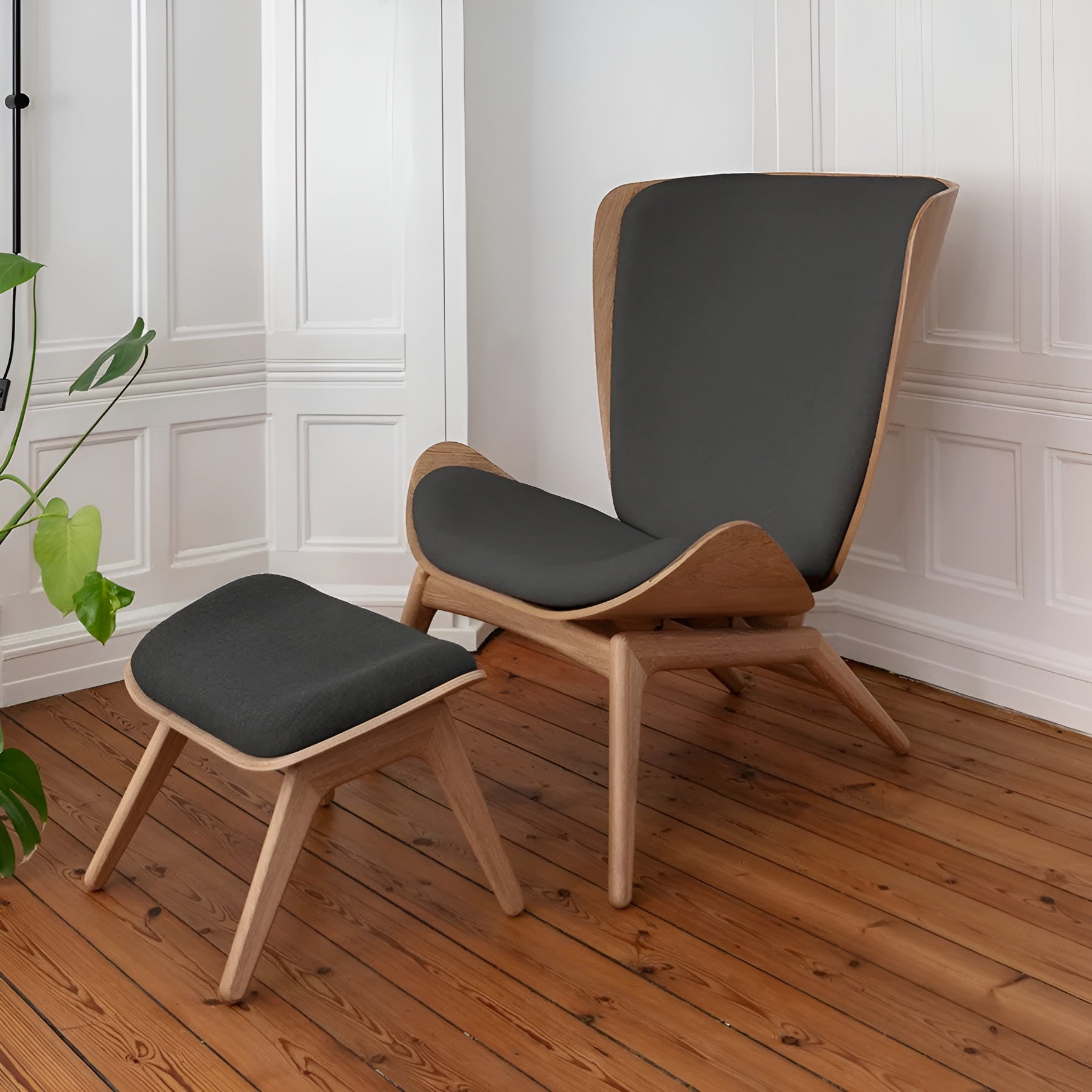 READER sage footrest with a black base