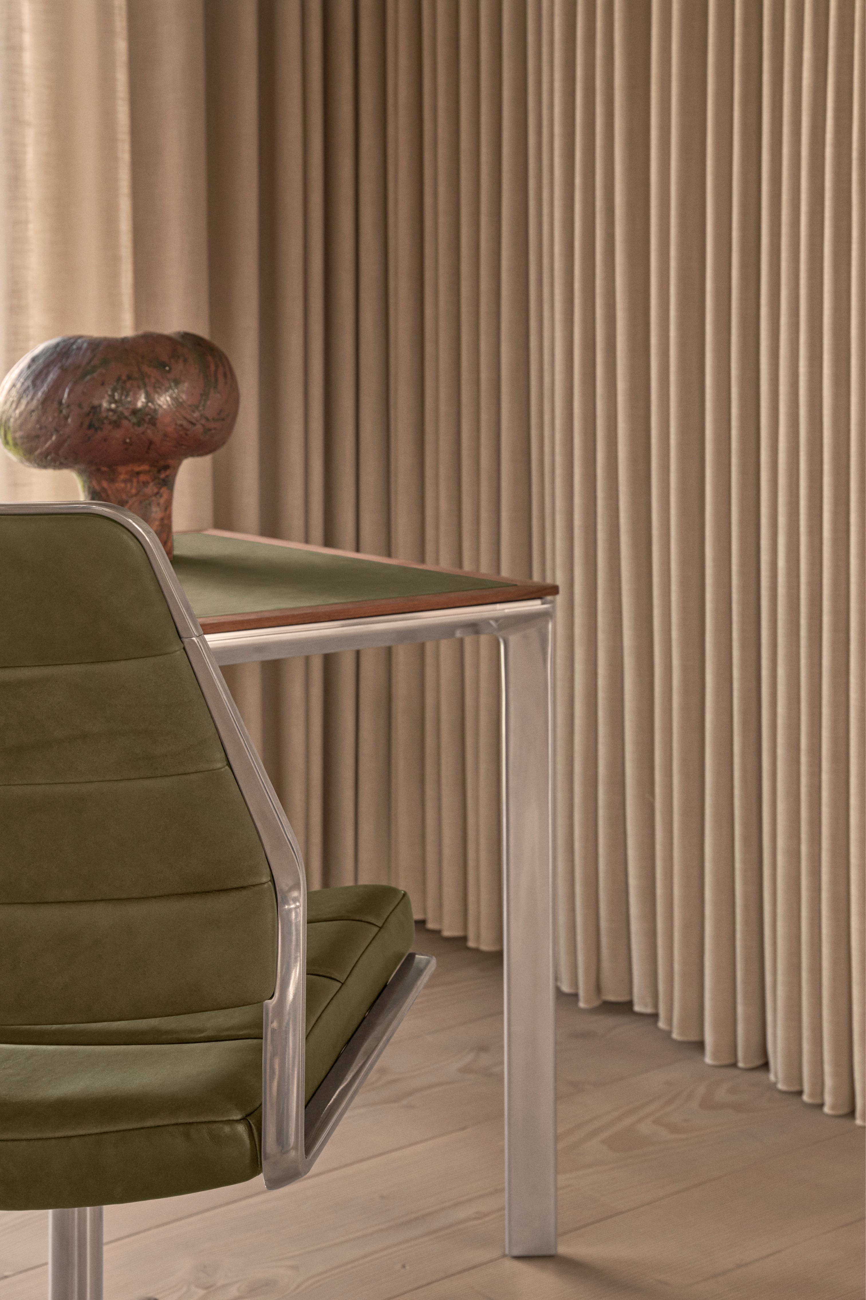Office chair 454 in light gray fabric with a metal base.